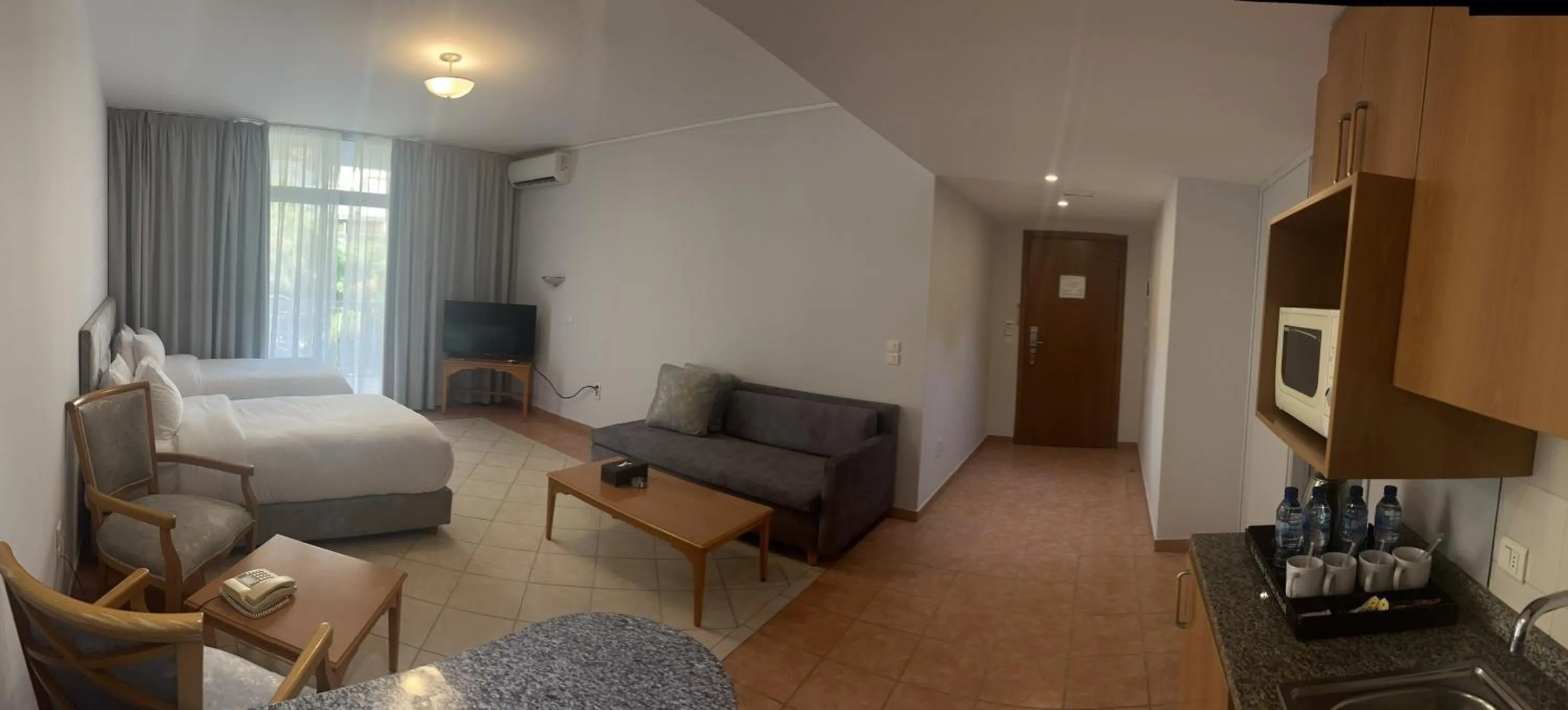 Living room, Bed in El Sheikh Suites Hotel