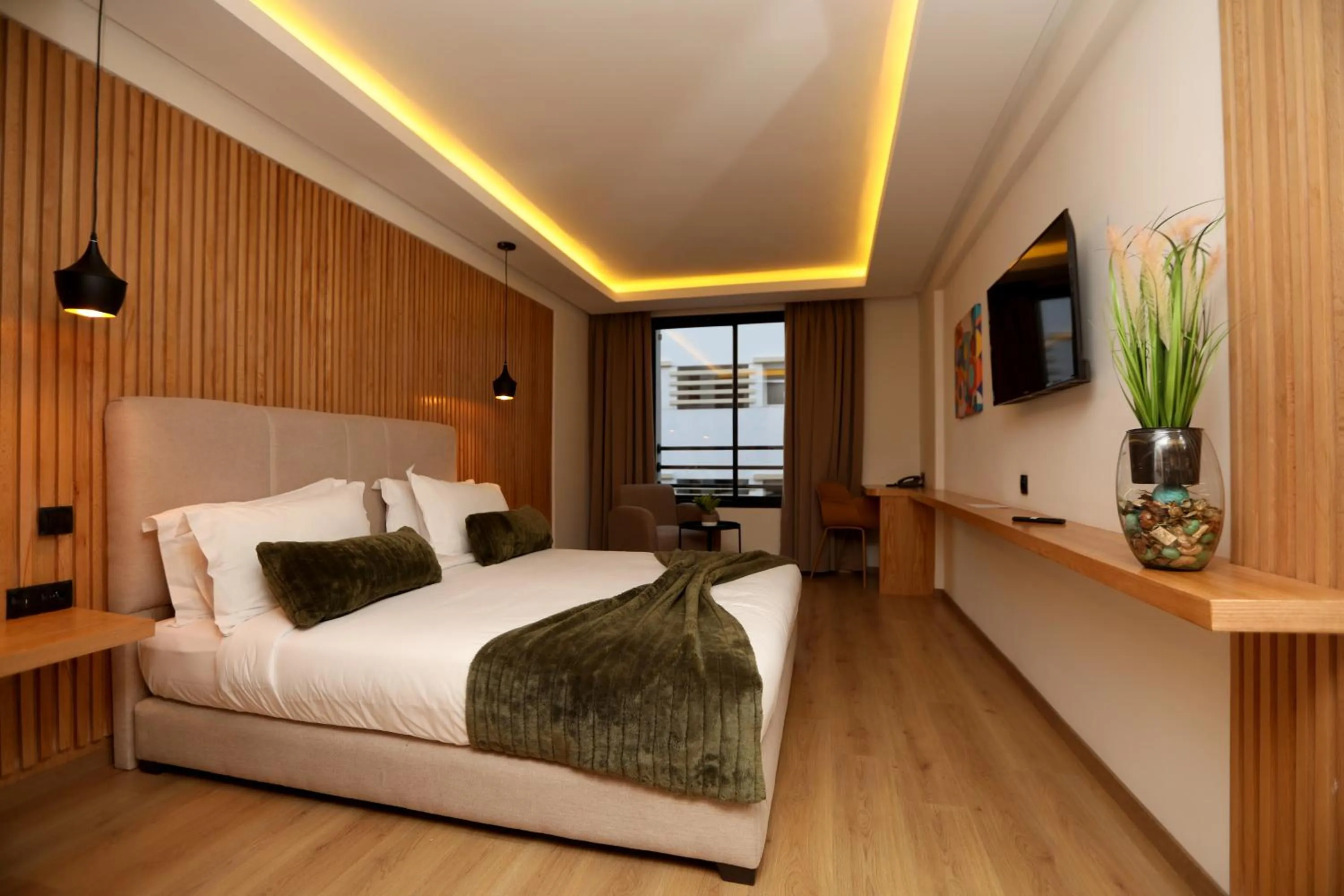 Communal lounge/ TV room, Bed in Unico Hotel & Spa Casablanca