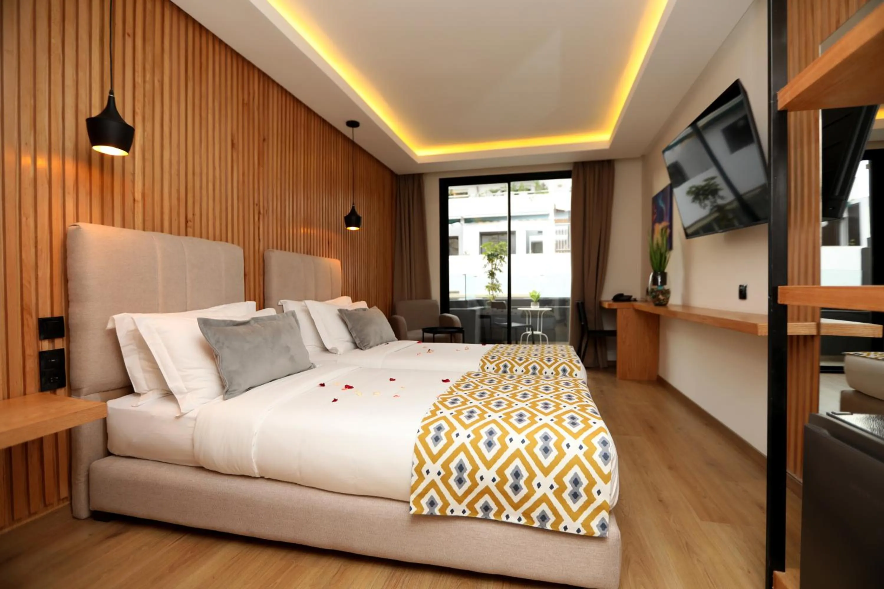 Communal lounge/ TV room, Bed in Unico Hotel & Spa Casablanca