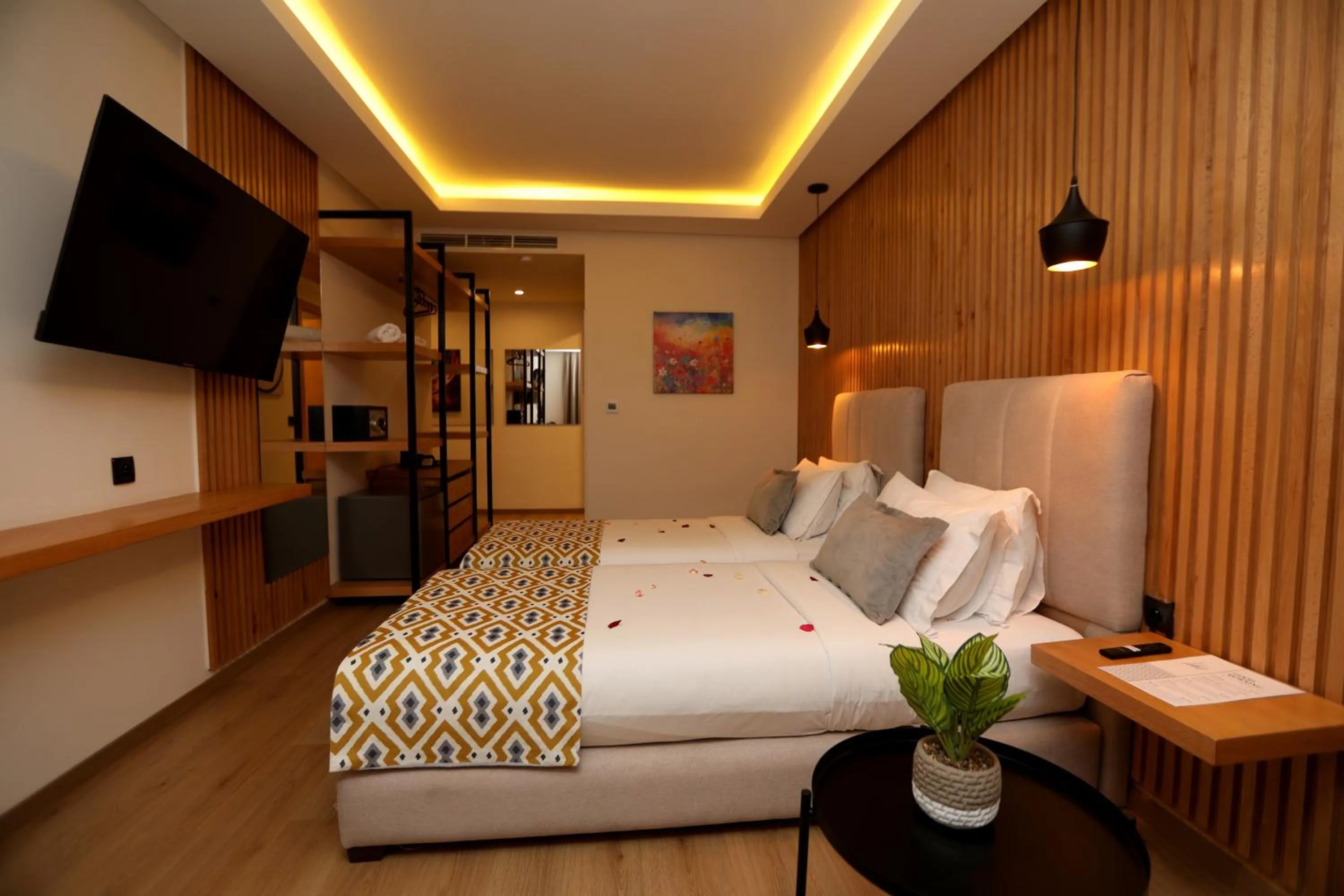 Communal lounge/ TV room, Bed in Unico Hotel & Spa Casablanca