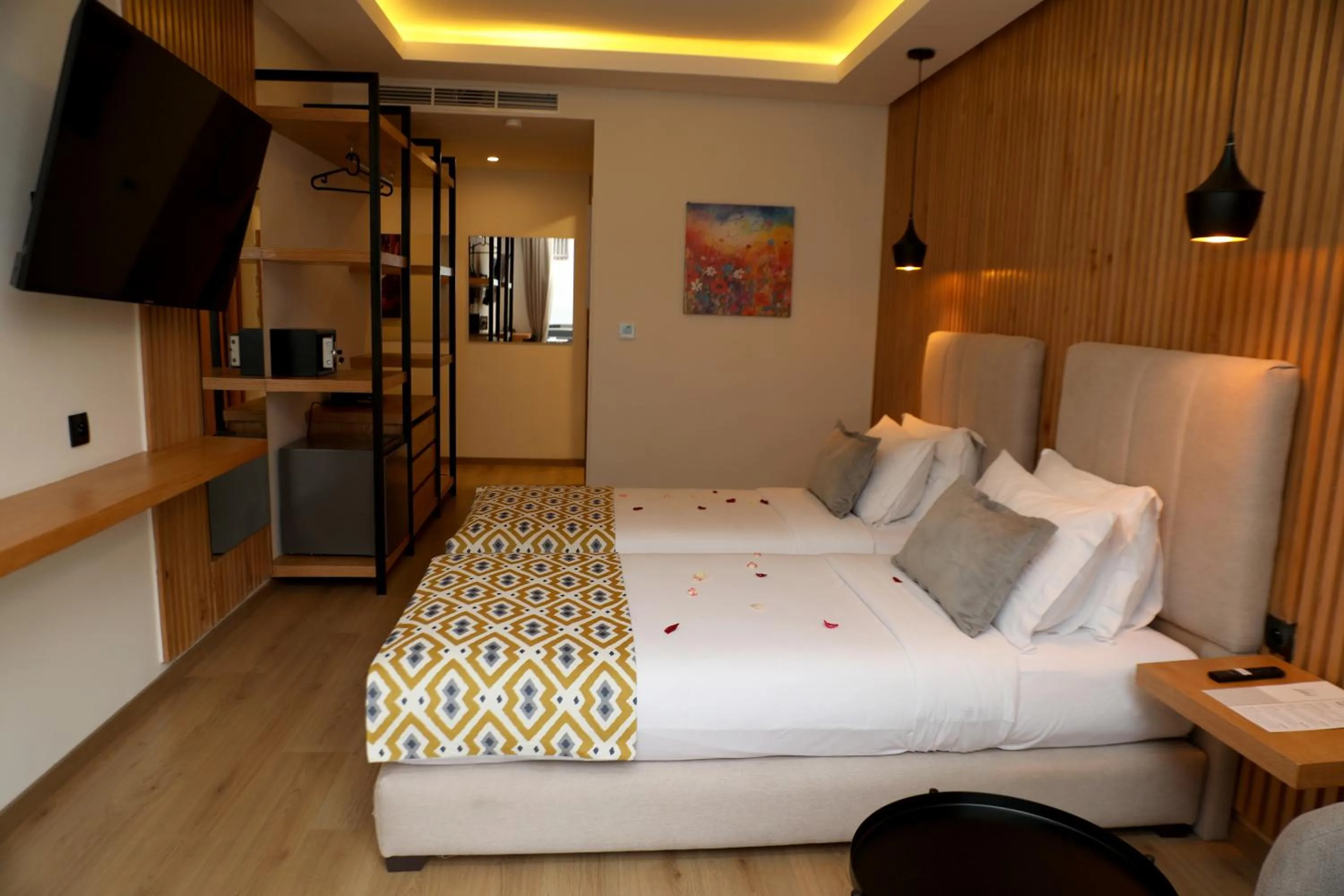 Communal lounge/ TV room, Bed in Unico Hotel & Spa Casablanca