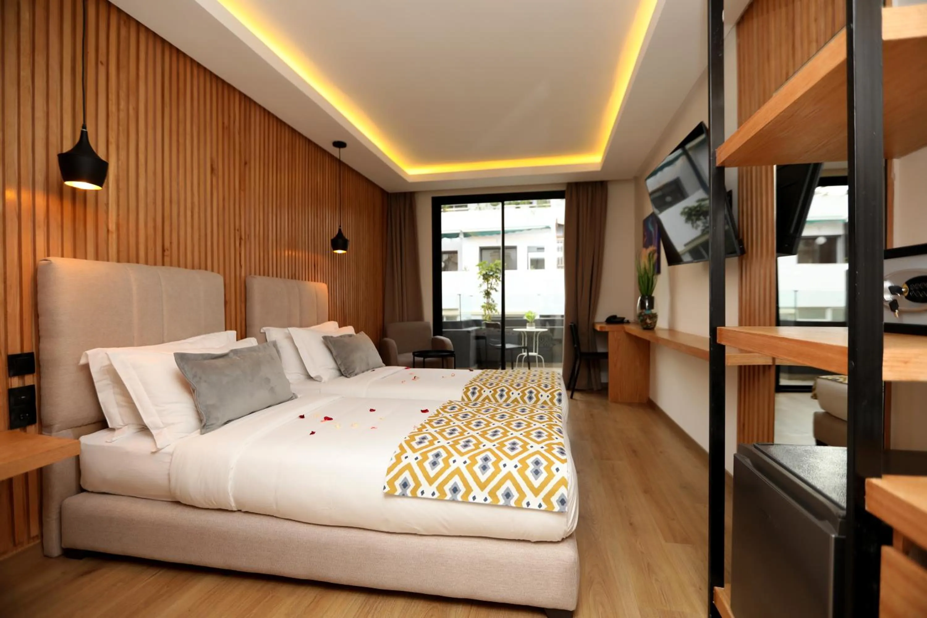 Communal lounge/ TV room, Bed in Unico Hotel & Spa Casablanca