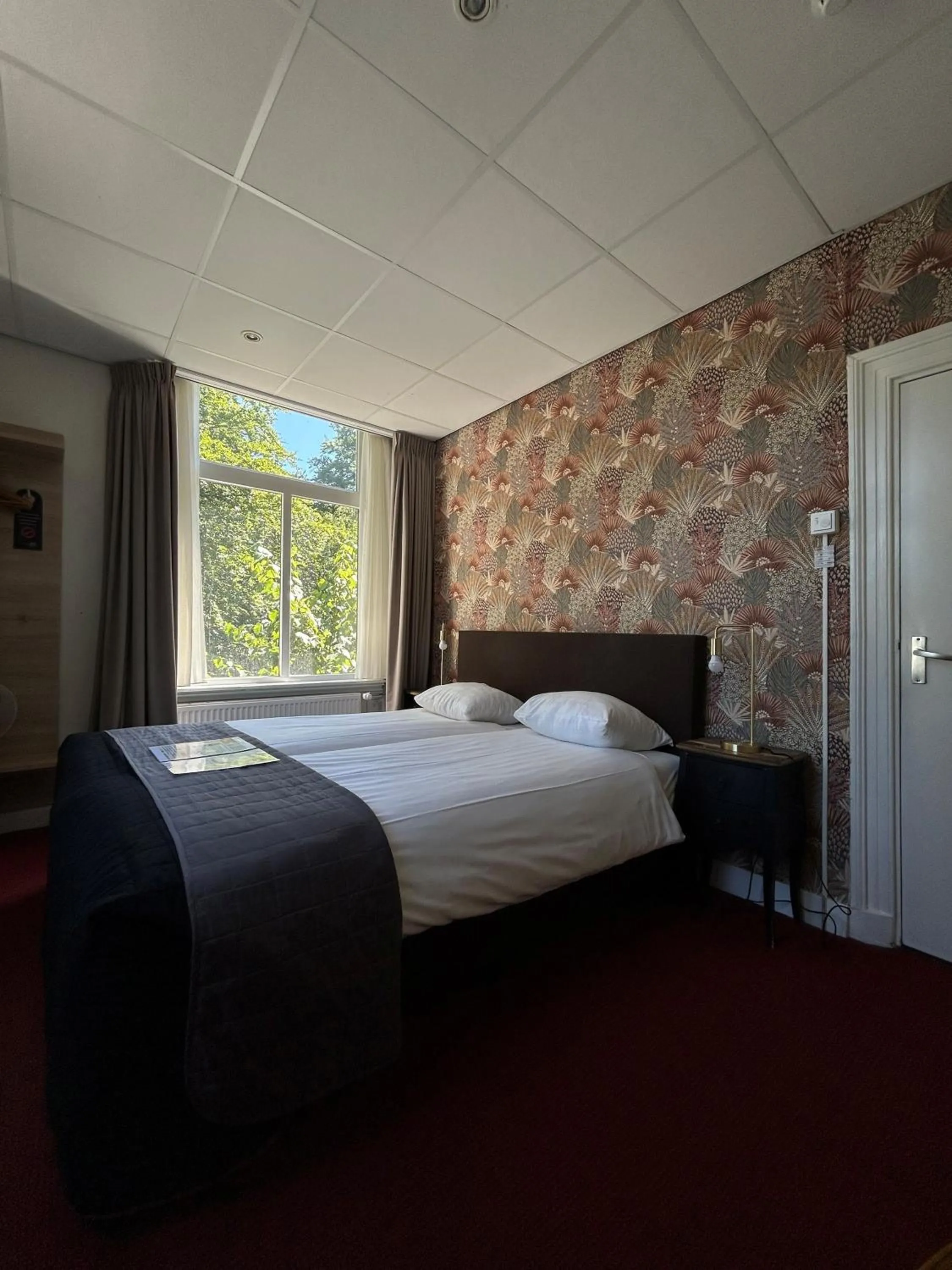 Bed in Boetiek Hotel BonAparte Lochem