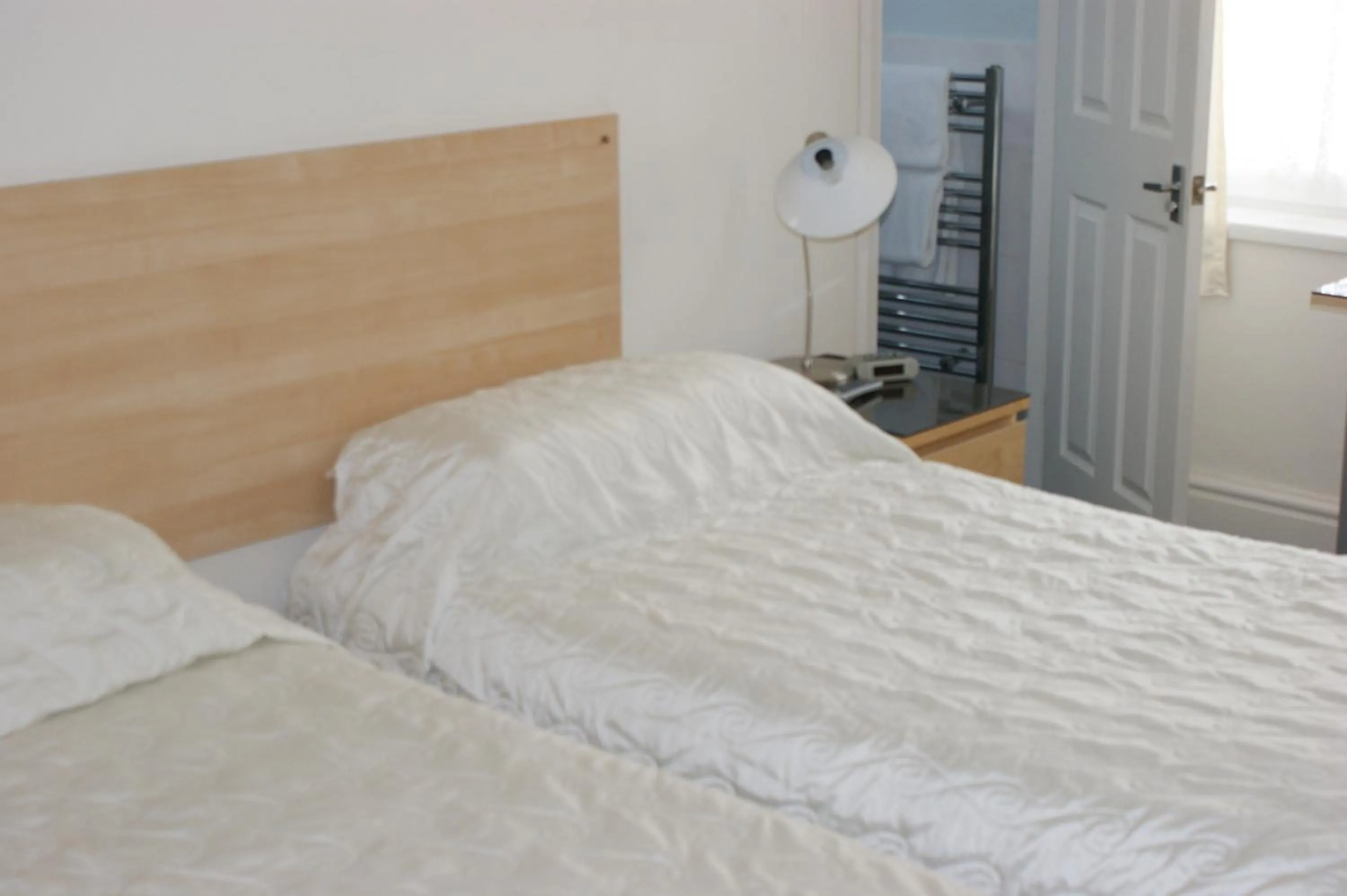 Bed in Beachcomber Hotel