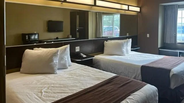 Bedroom, Bed in Studio 6 Suites Breaux Bridge, LA