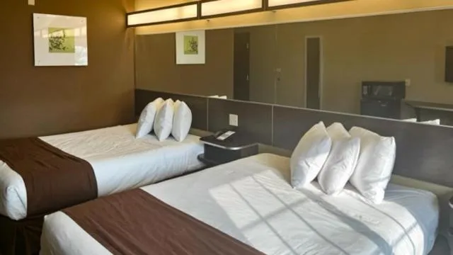 Bedroom, Bed in Studio 6 Suites Breaux Bridge, LA