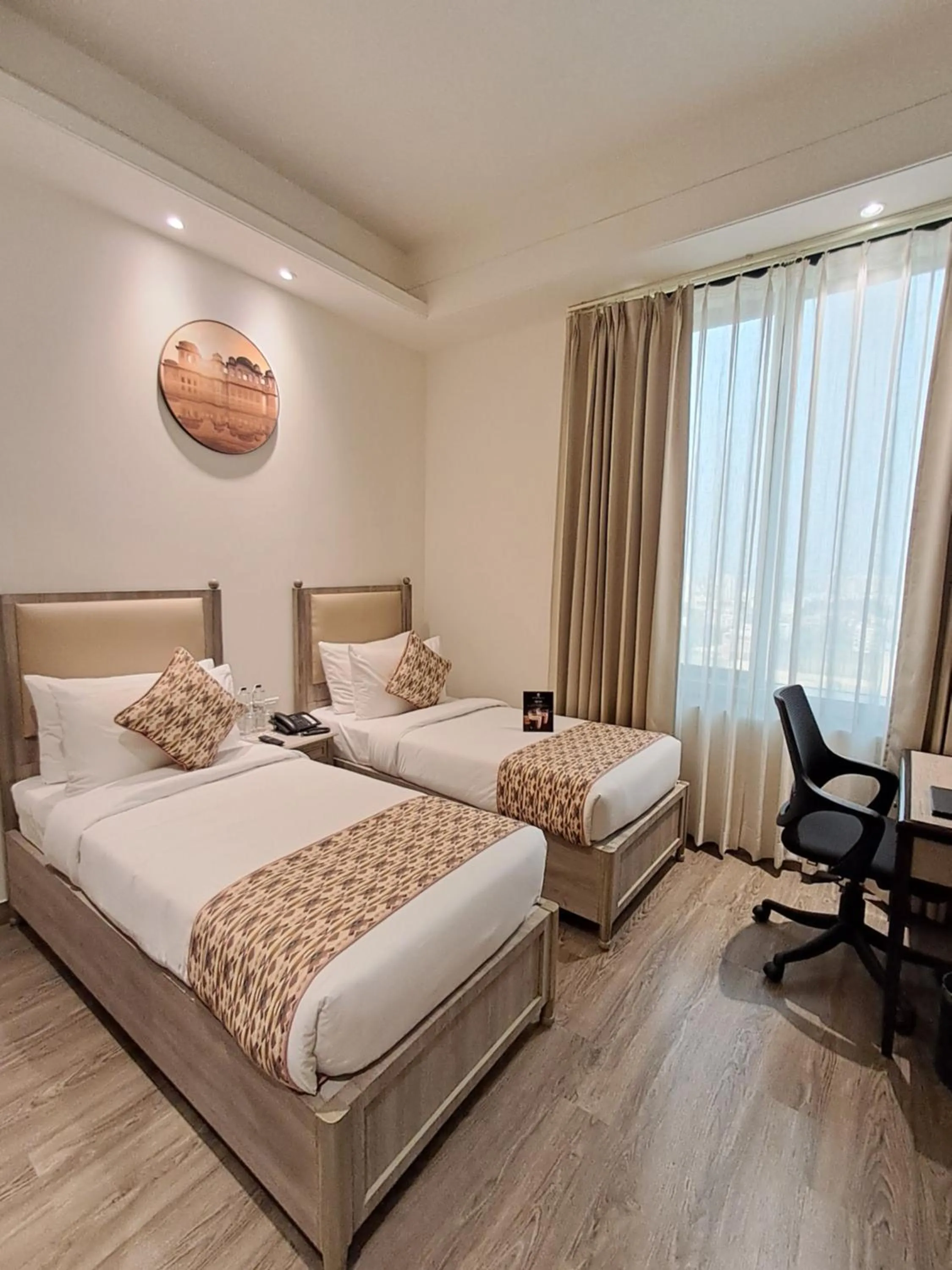 Photo of the whole room, Bed in Rhythm Gurugram Hotel & Suites, Sohna Road