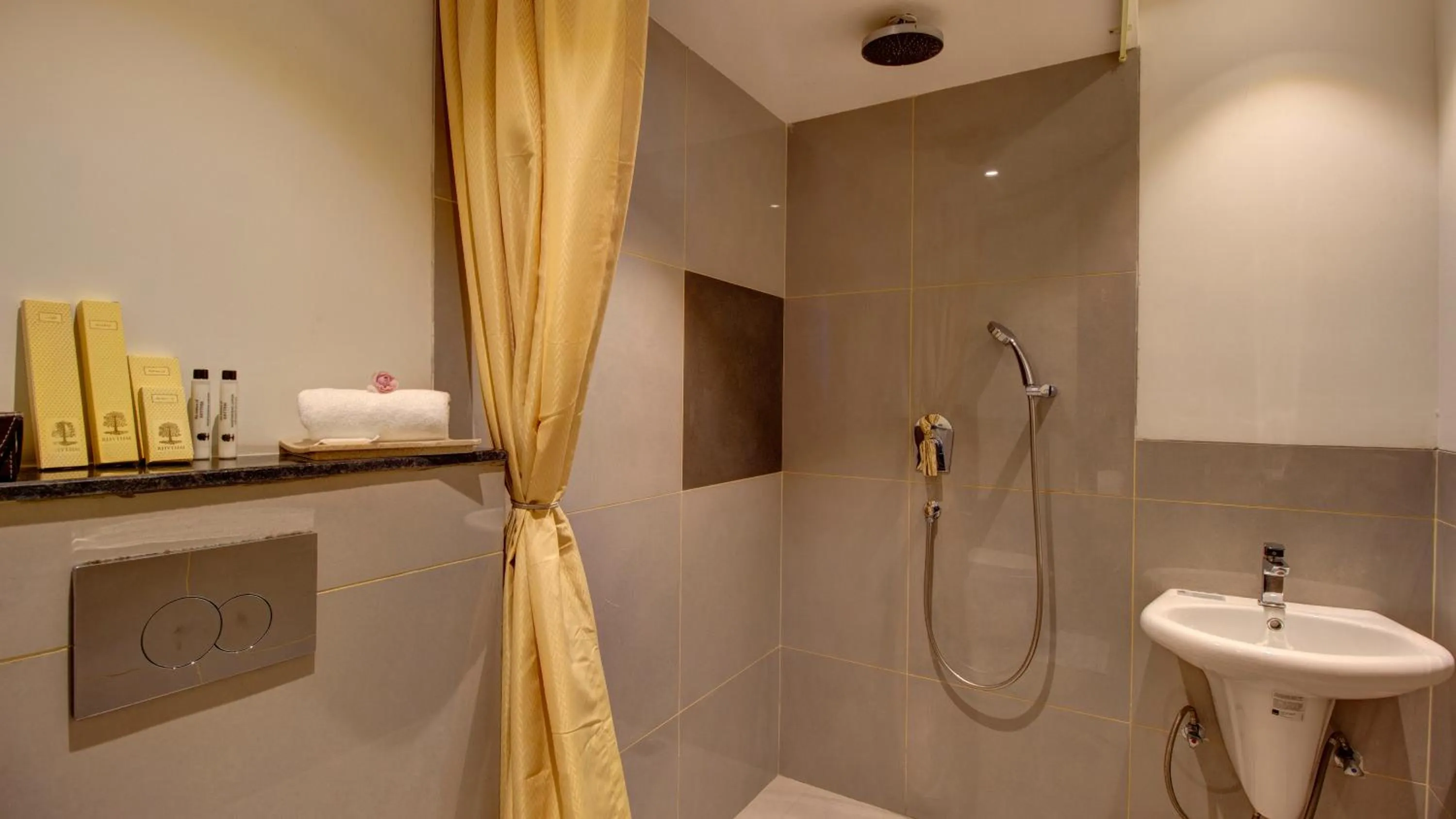 Bathroom in Rhythm Gurugram Hotel & Suites, Sohna Road