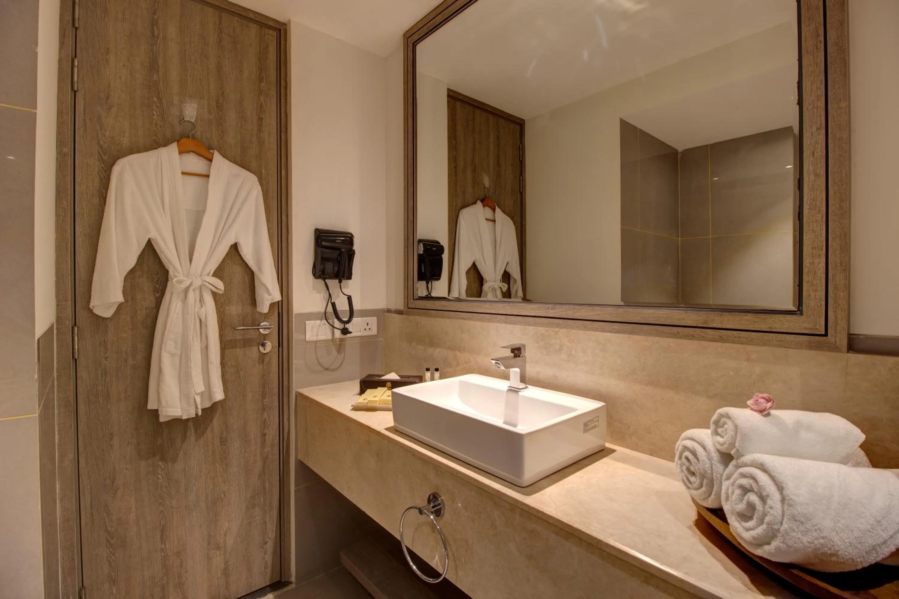 Bathroom in Rhythm Gurugram Hotel & Suites, Sohna Road