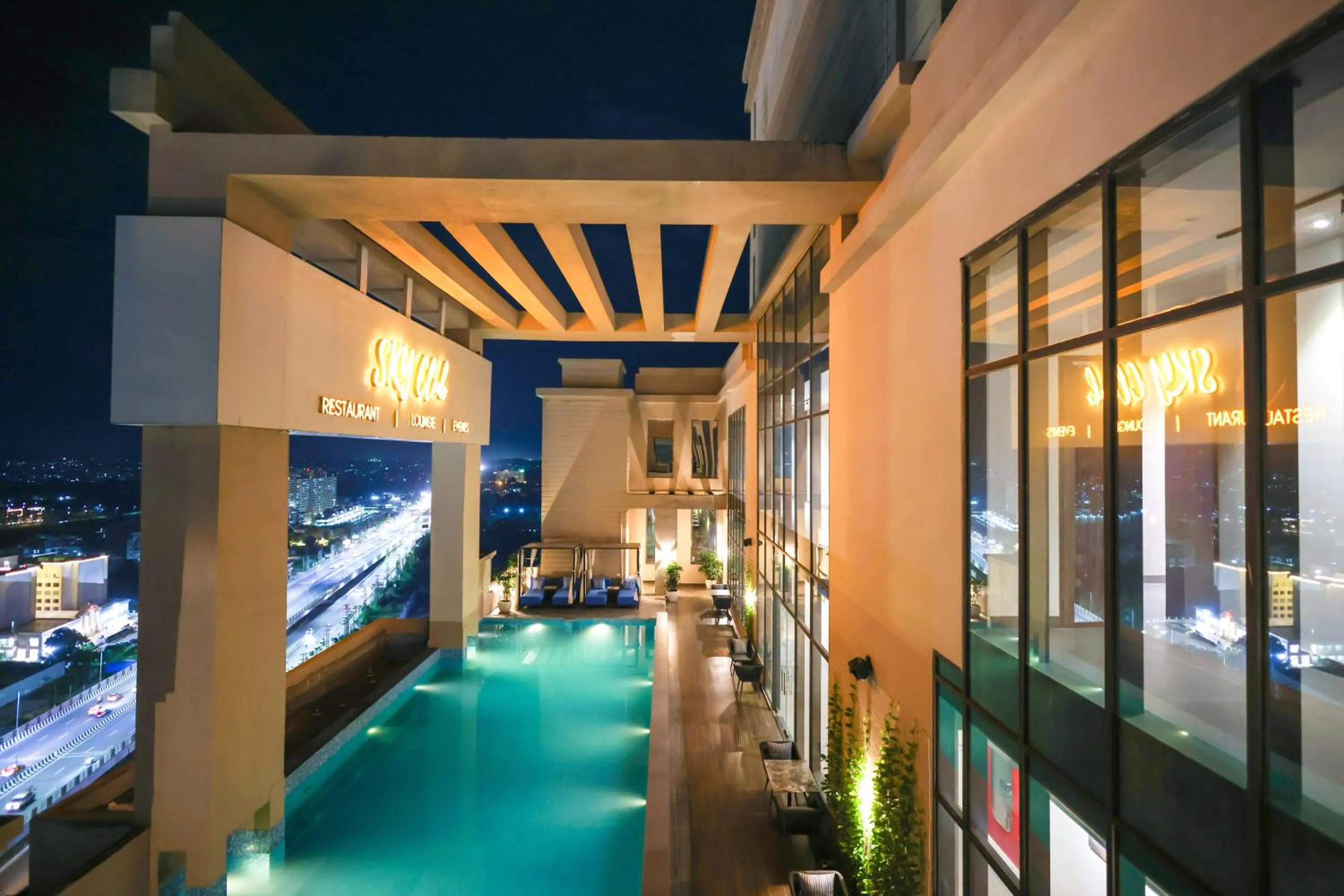 Swimming pool in Rhythm Gurugram Hotel & Suites, Sohna Road