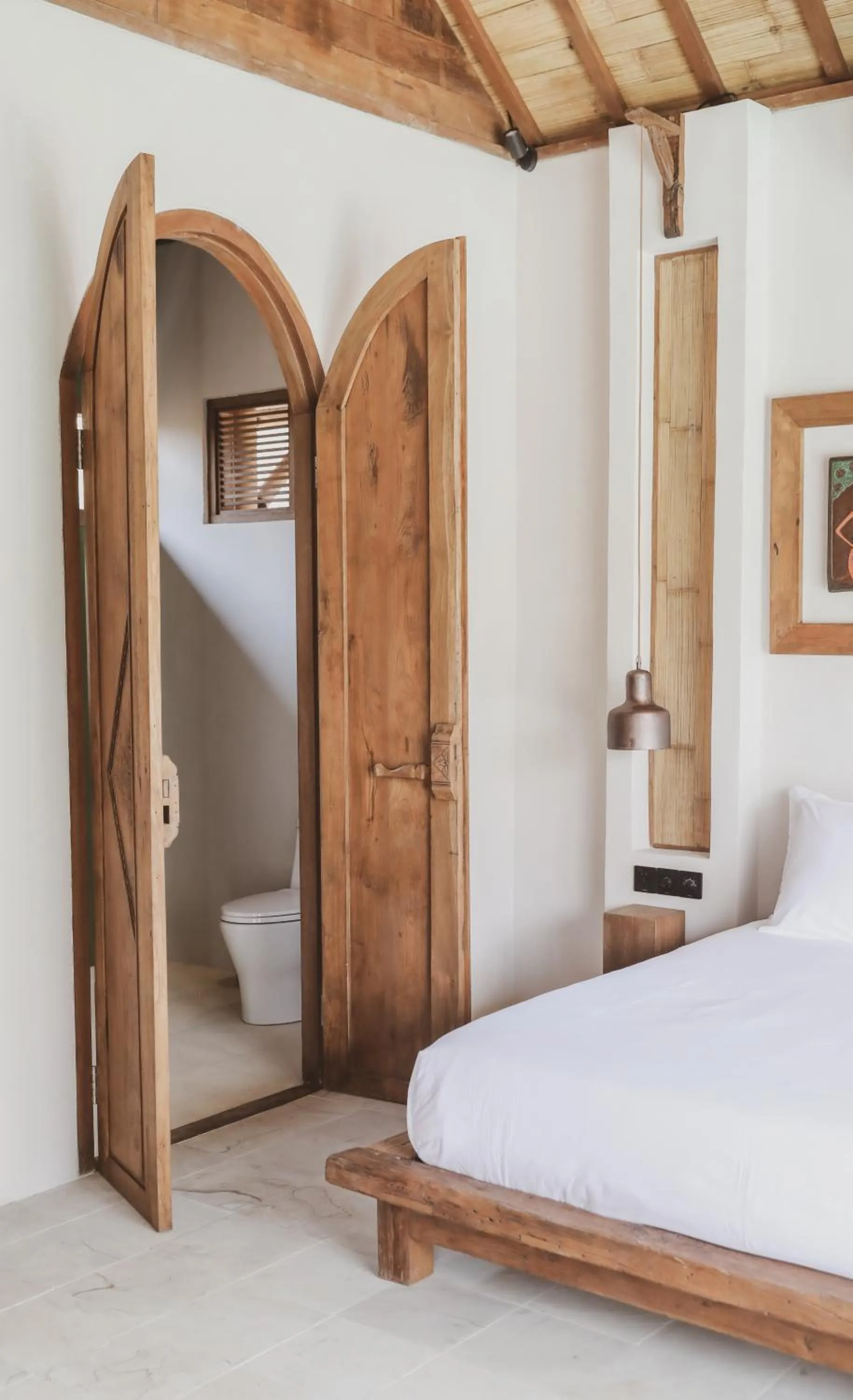 Bed in Kalyana Villa Gili Air