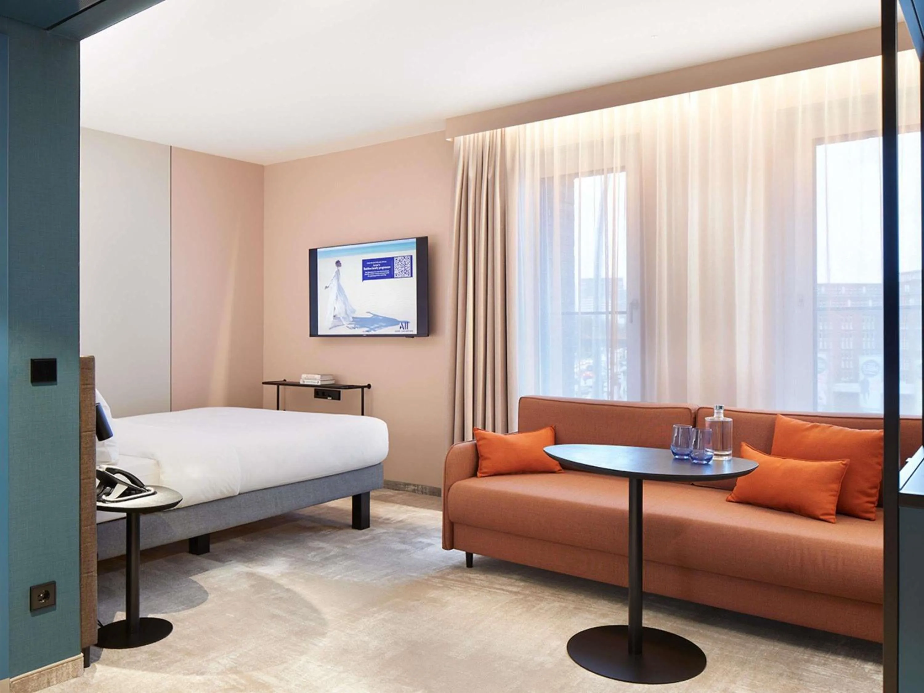 Photo of the whole room, Bed in Novotel Hamburg Central Station