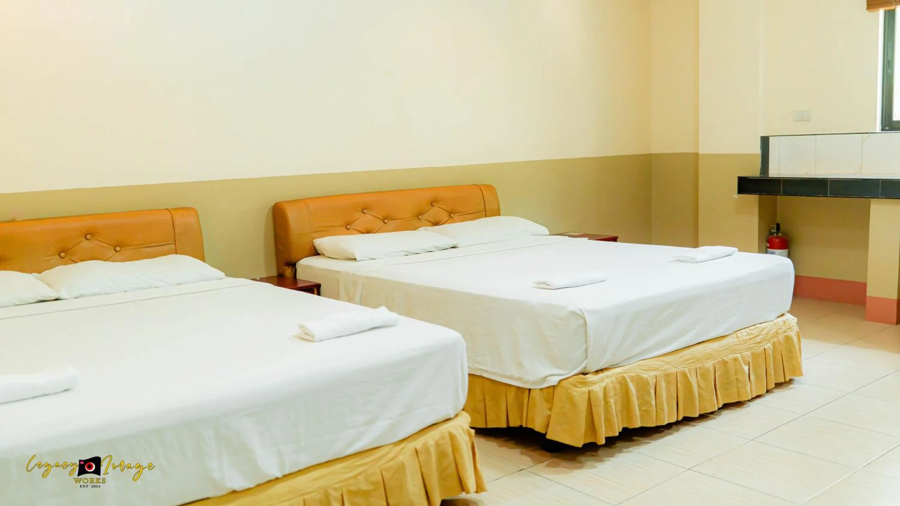 Bed in Imperial Ridge Pension House