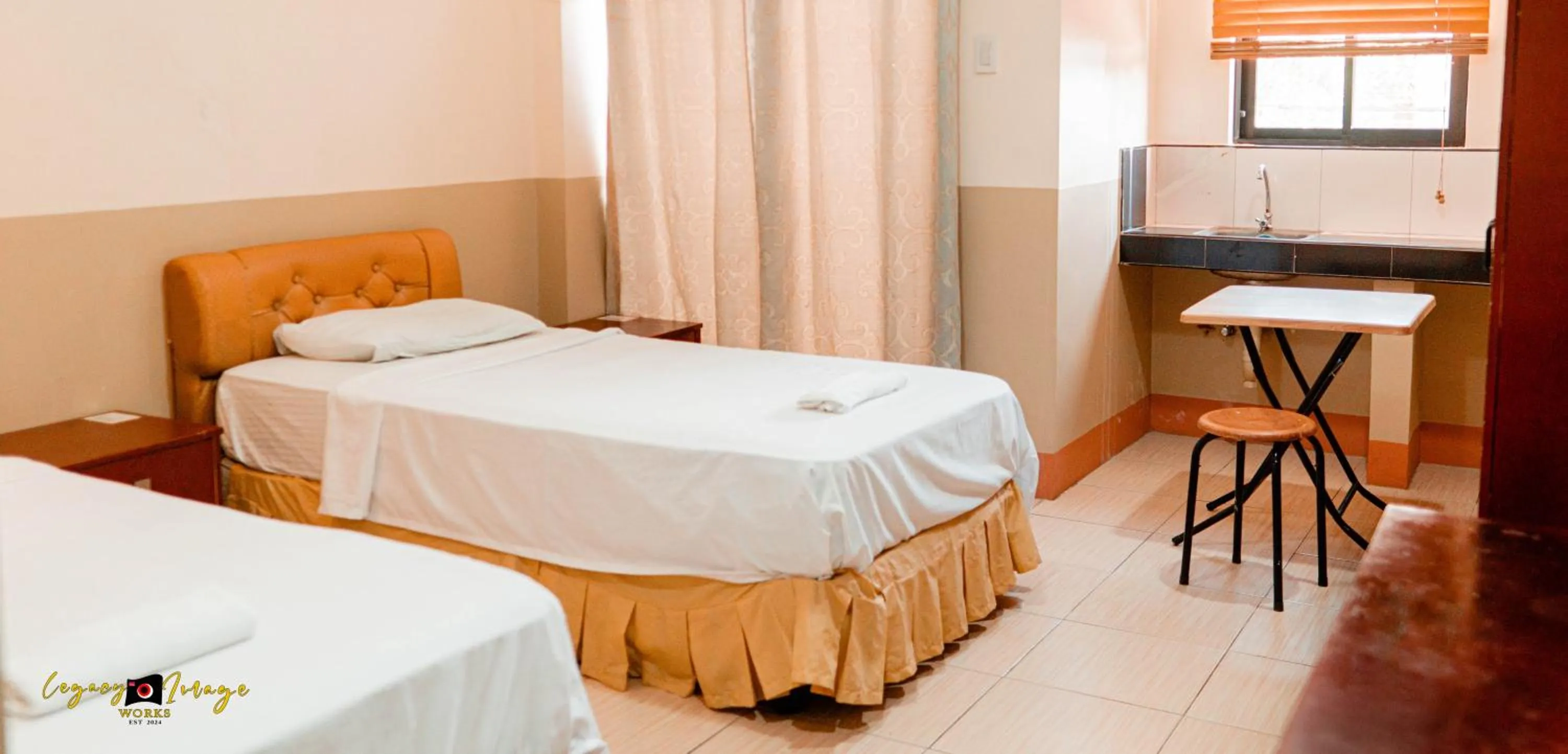 Bed in Imperial Ridge Pension House