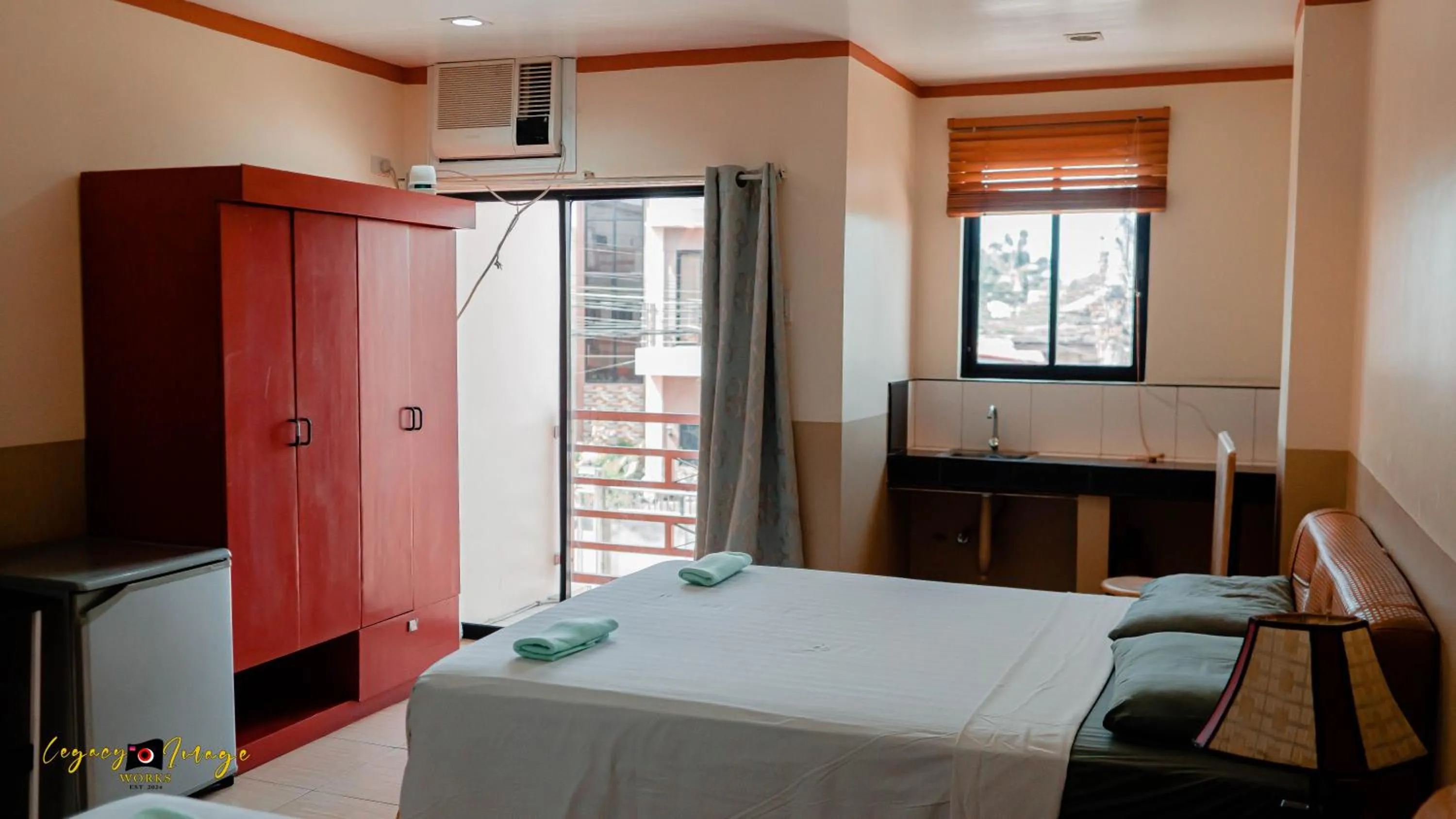 Bed in Imperial Ridge Pension House