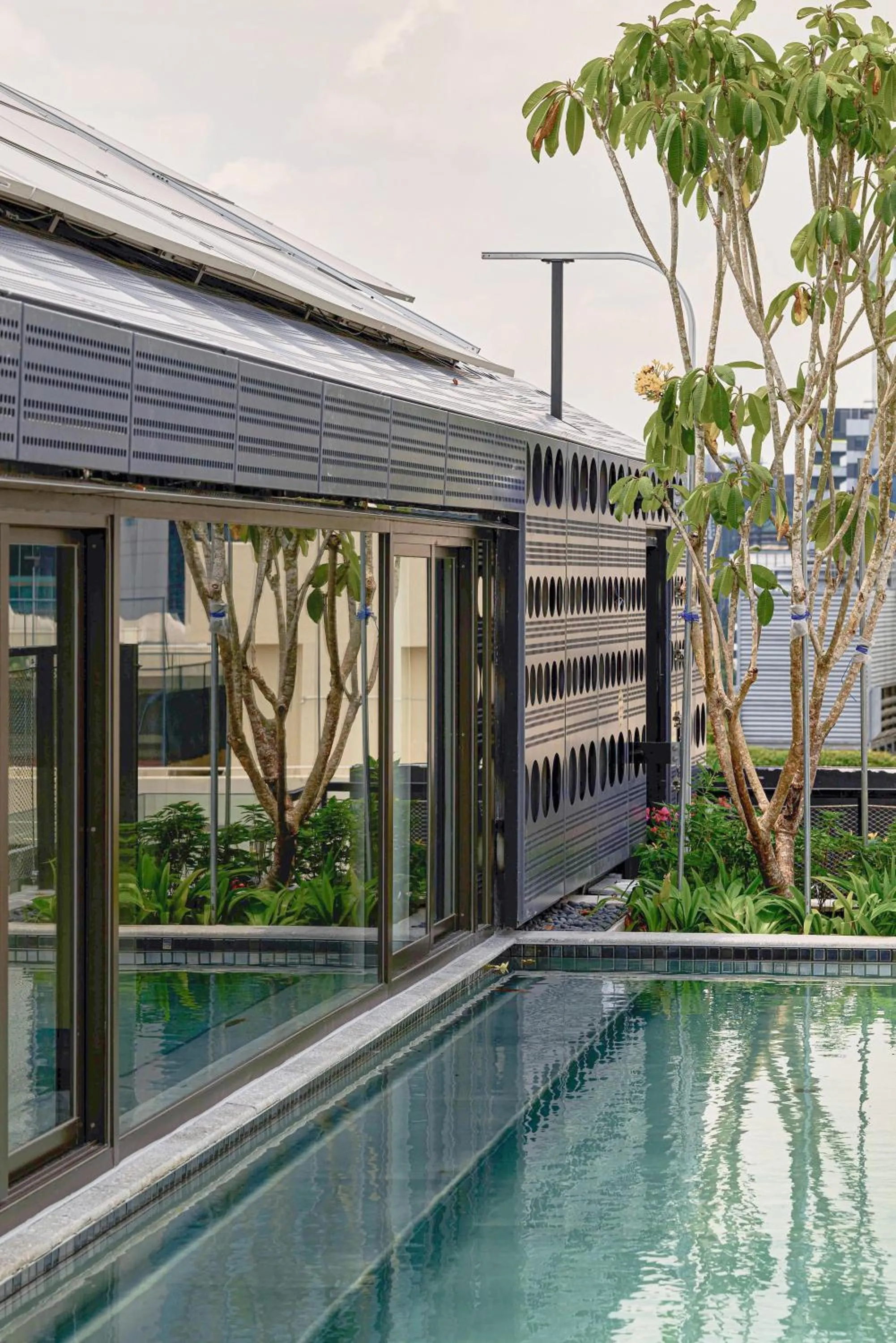 Swimming pool in 21 Carpenter, Singapore, a Member of Design Hotels