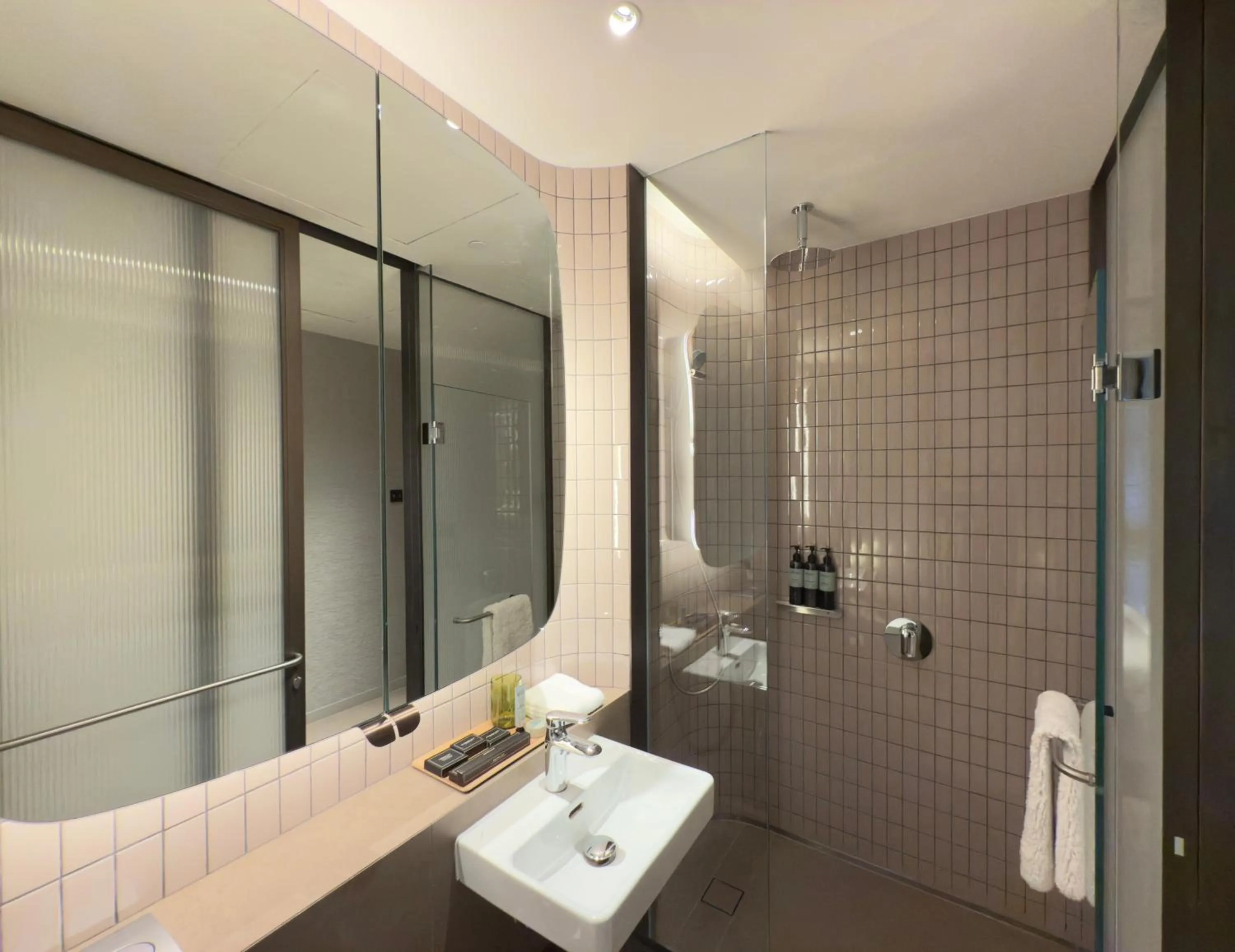 Shower in 21 Carpenter, Singapore, a Member of Design Hotels