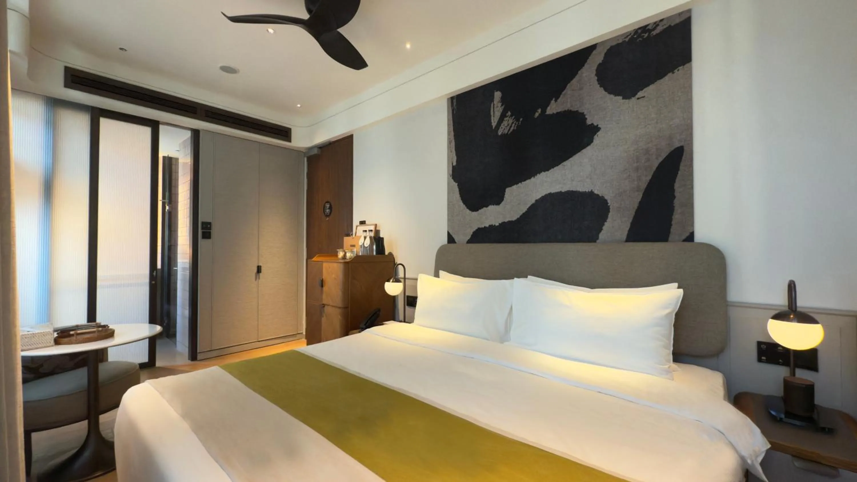 Bed in 21 Carpenter, Singapore, a Member of Design Hotels