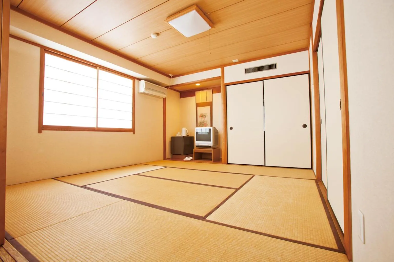 Bedroom in HOTEL THE NEXT KANKU