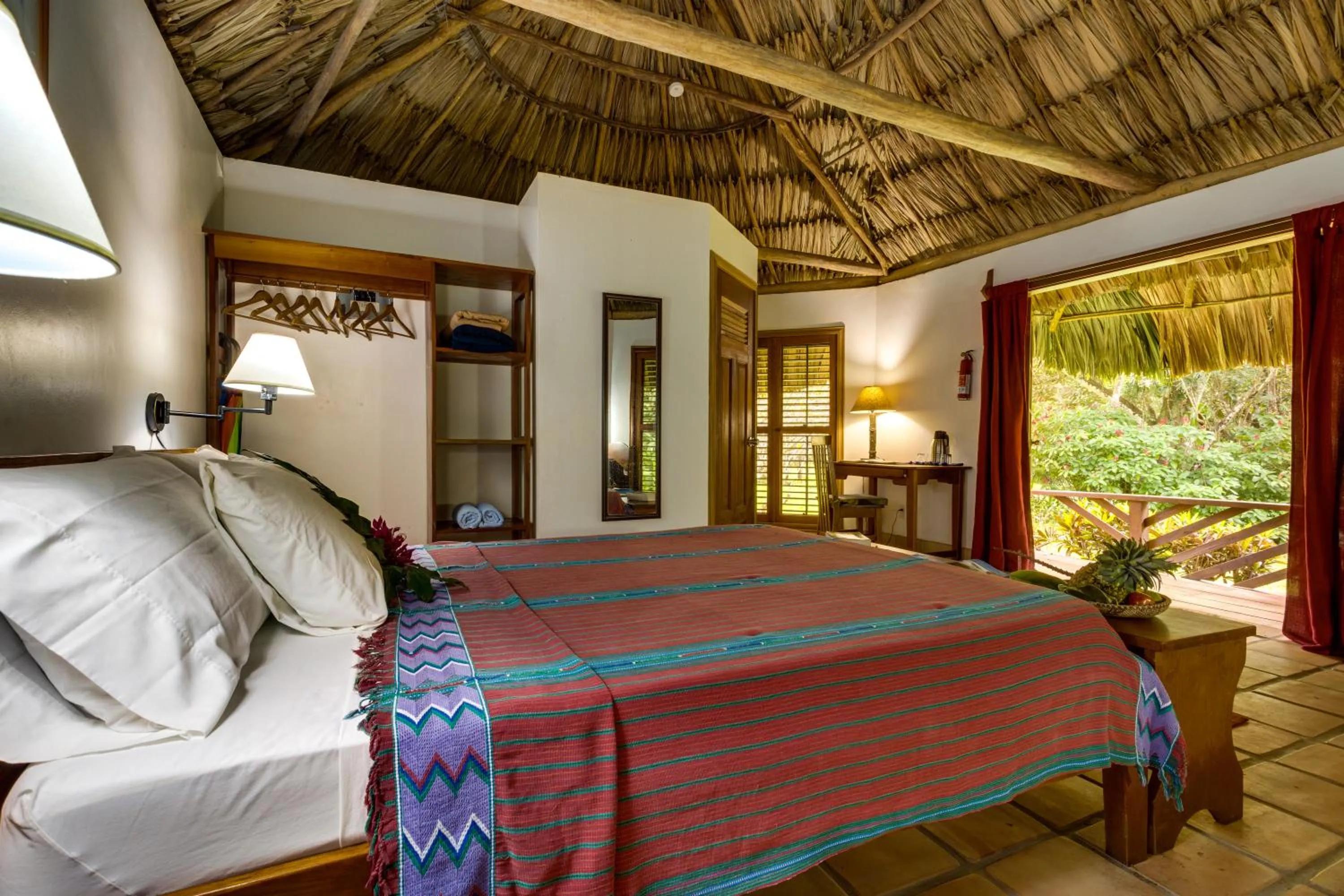 Bed in Tanager RainForest Lodge