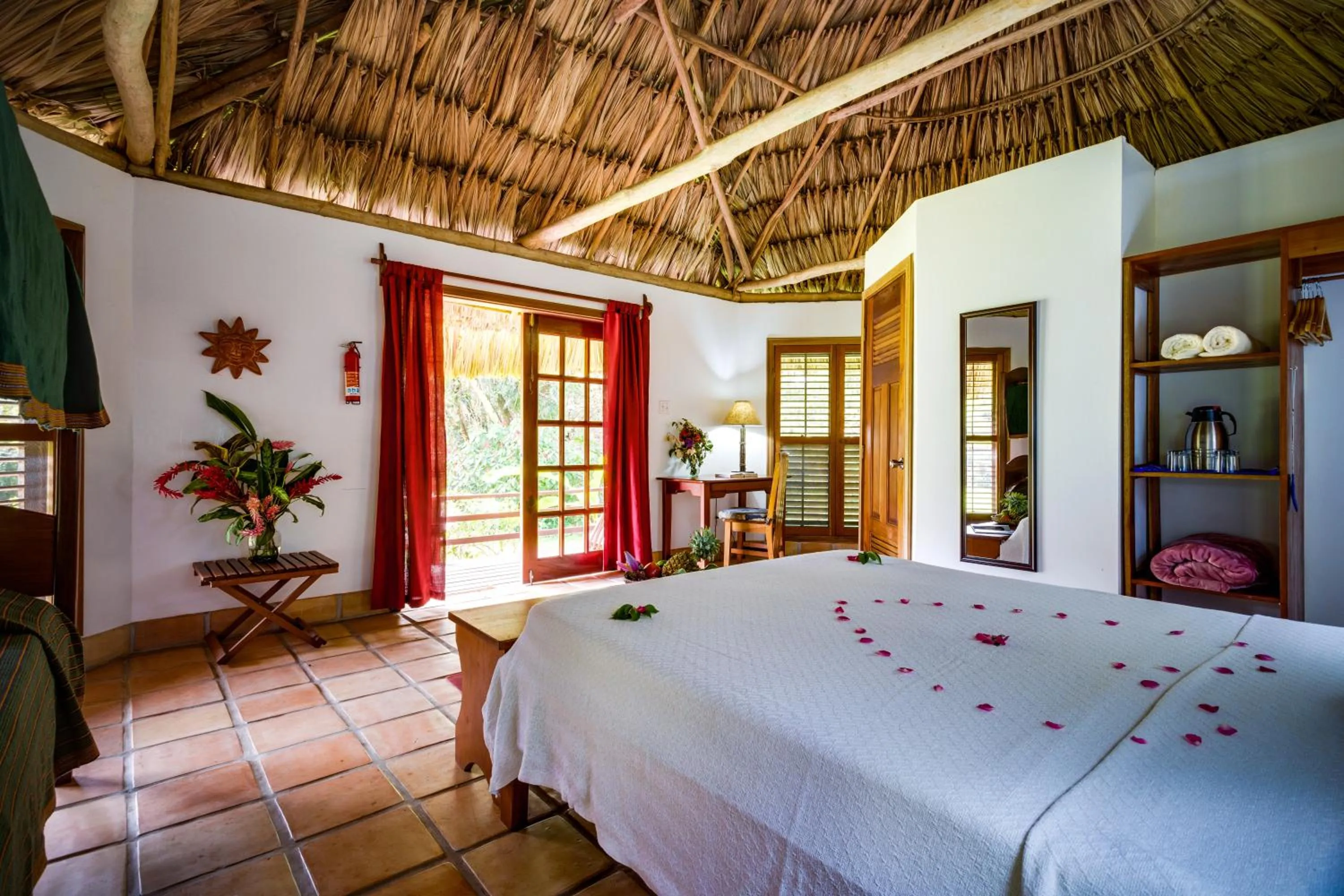 Bed in Tanager RainForest Lodge