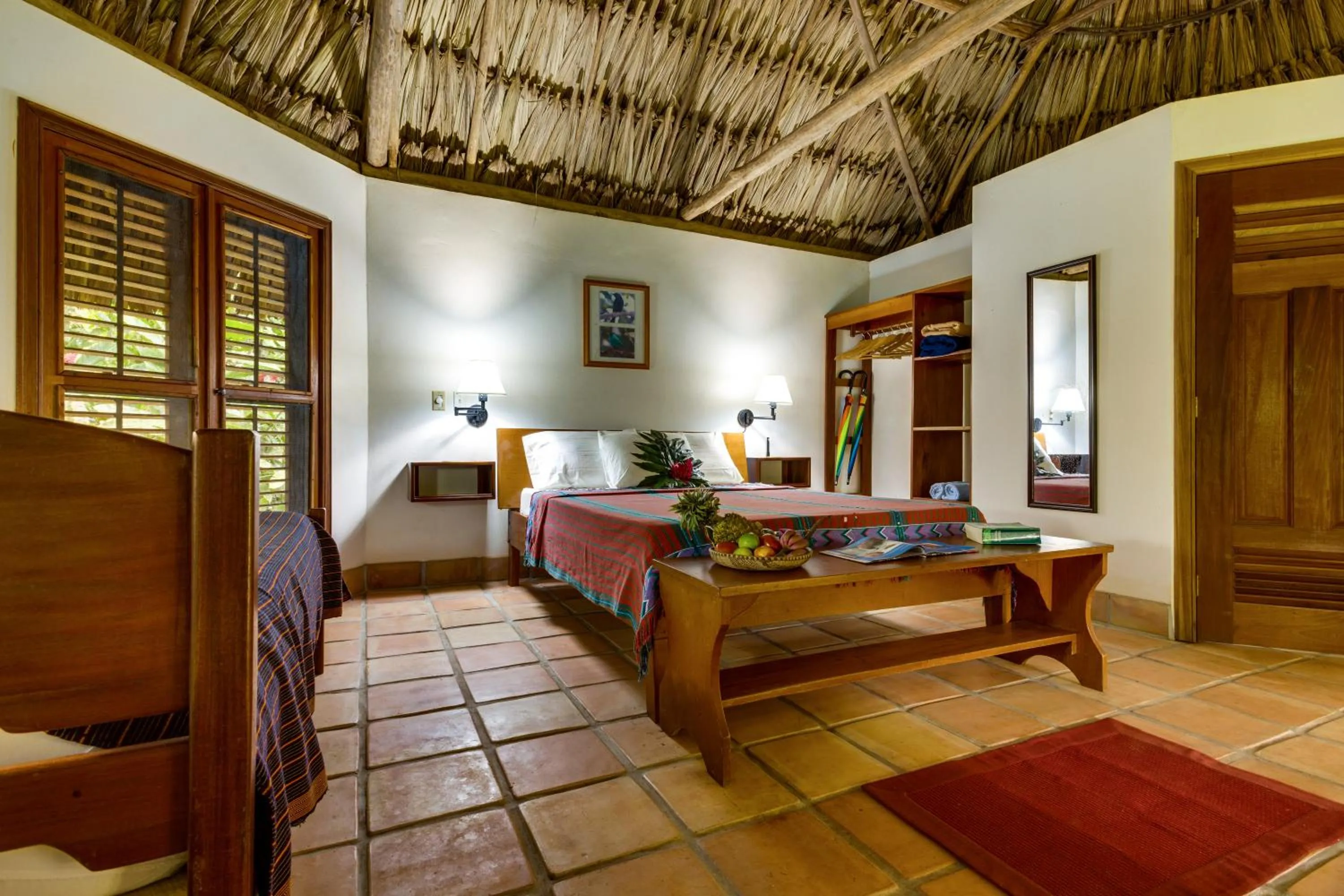 Bed in Tanager RainForest Lodge