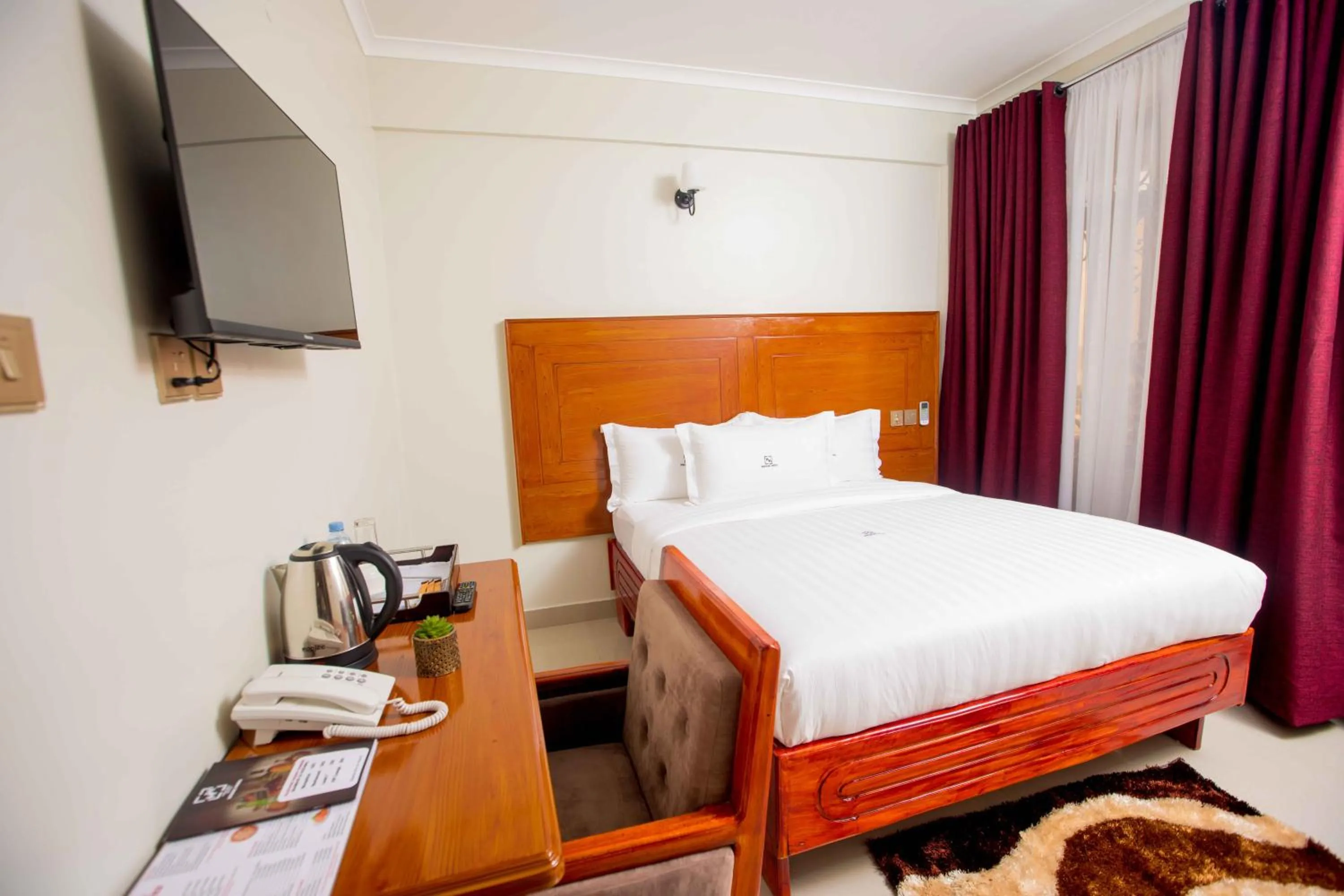 Bed in HADJENS HOTEL