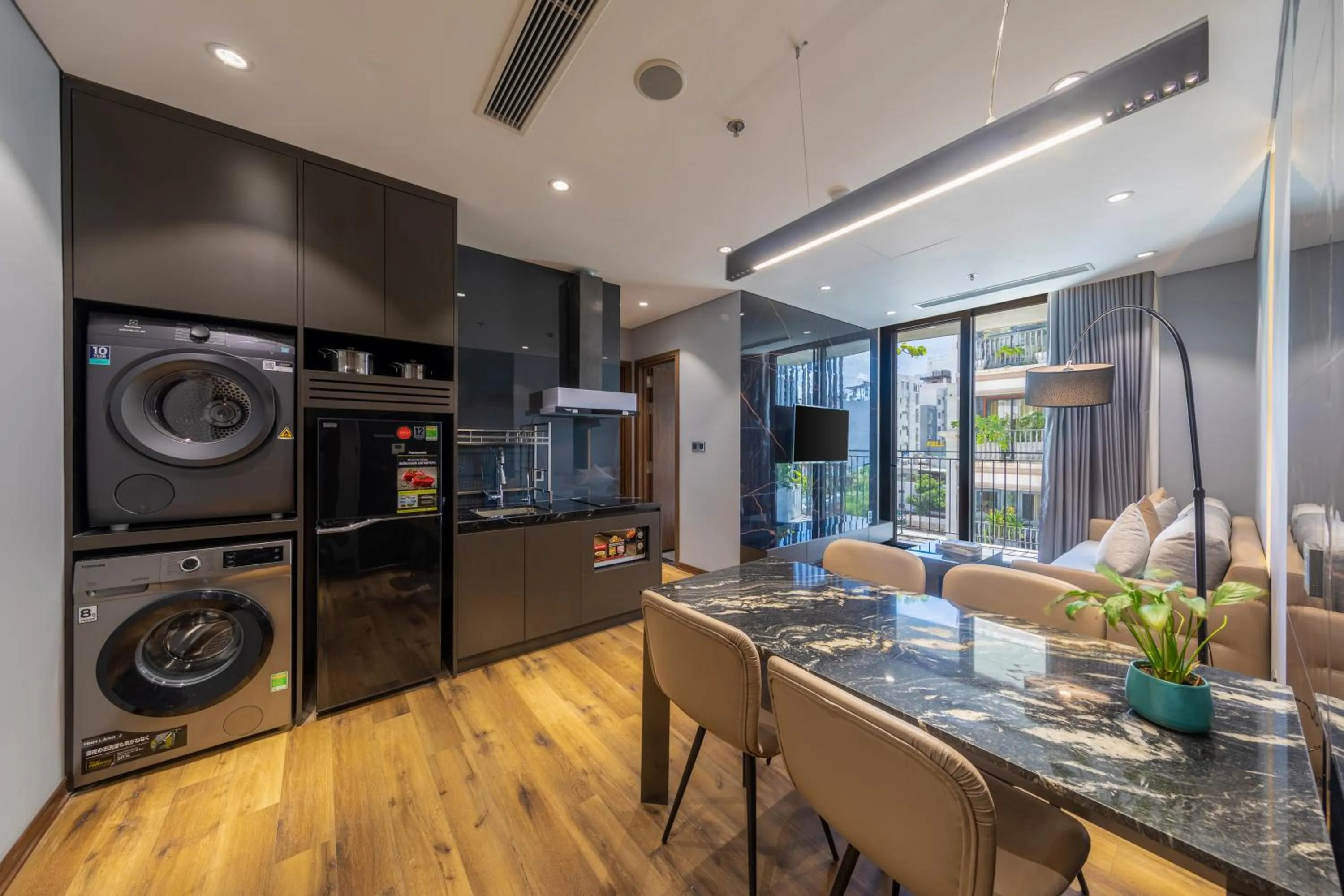 Kitchen or kitchenette in Taiyo Hotel & Apartment