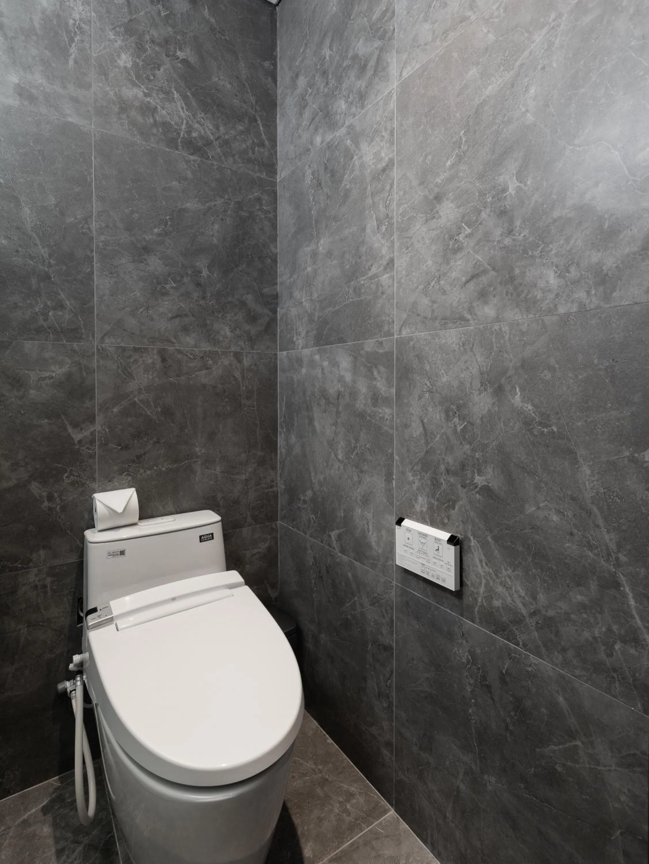 Toilet in Taiyo Hotel & Apartment