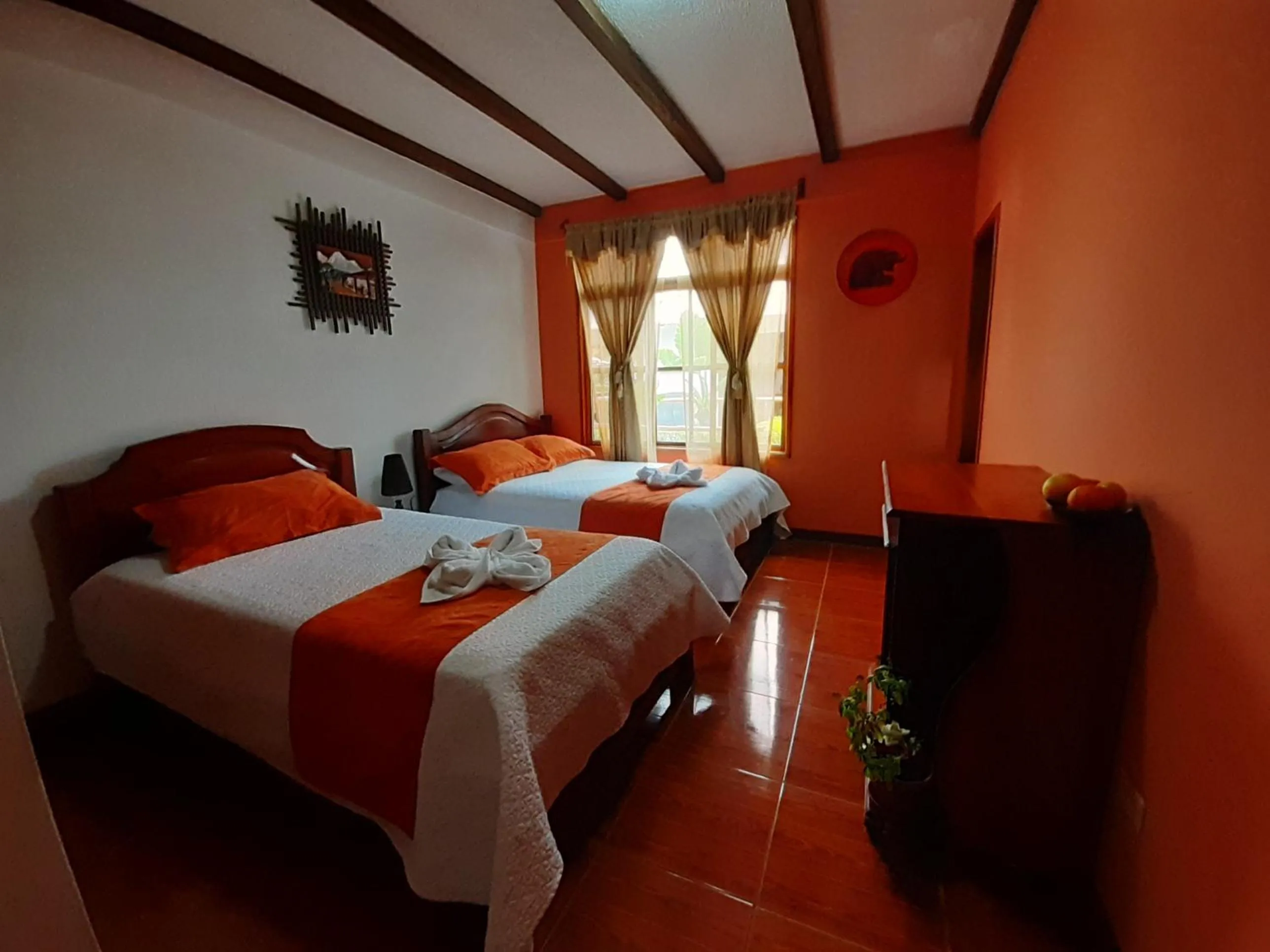 Bed in Suymar Ecolodge Galapagos