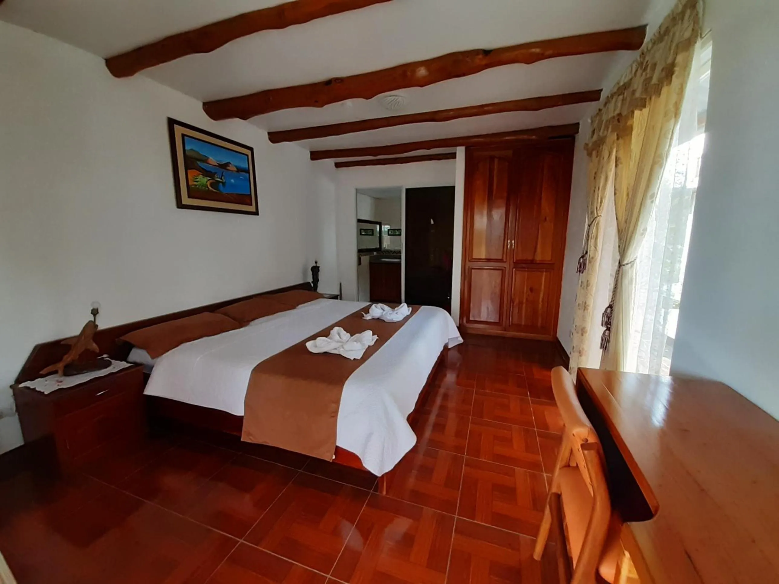 Bed in Suymar Ecolodge Galapagos