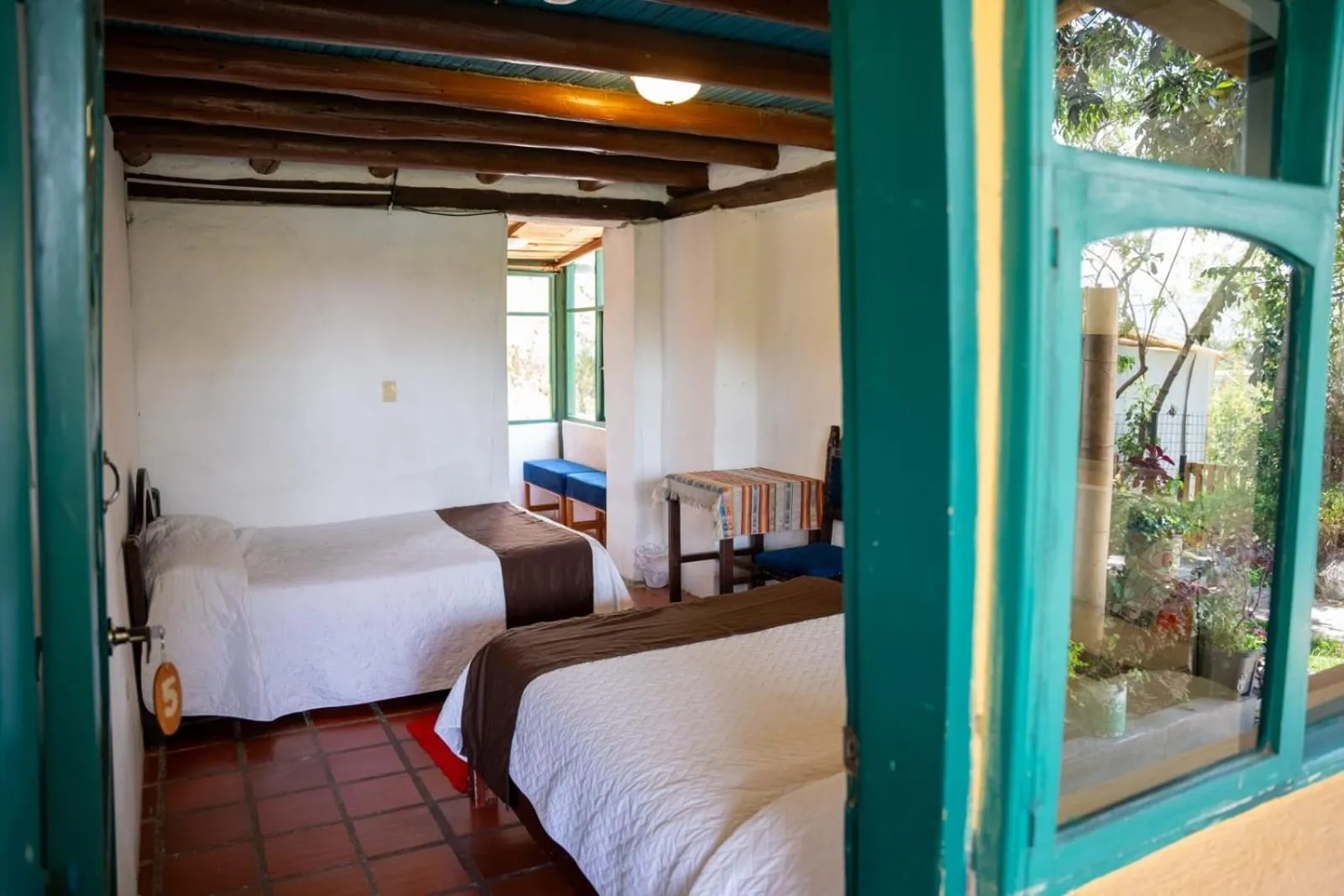 Photo of the whole room, Bed in Hostería Colibri Aeropuerto