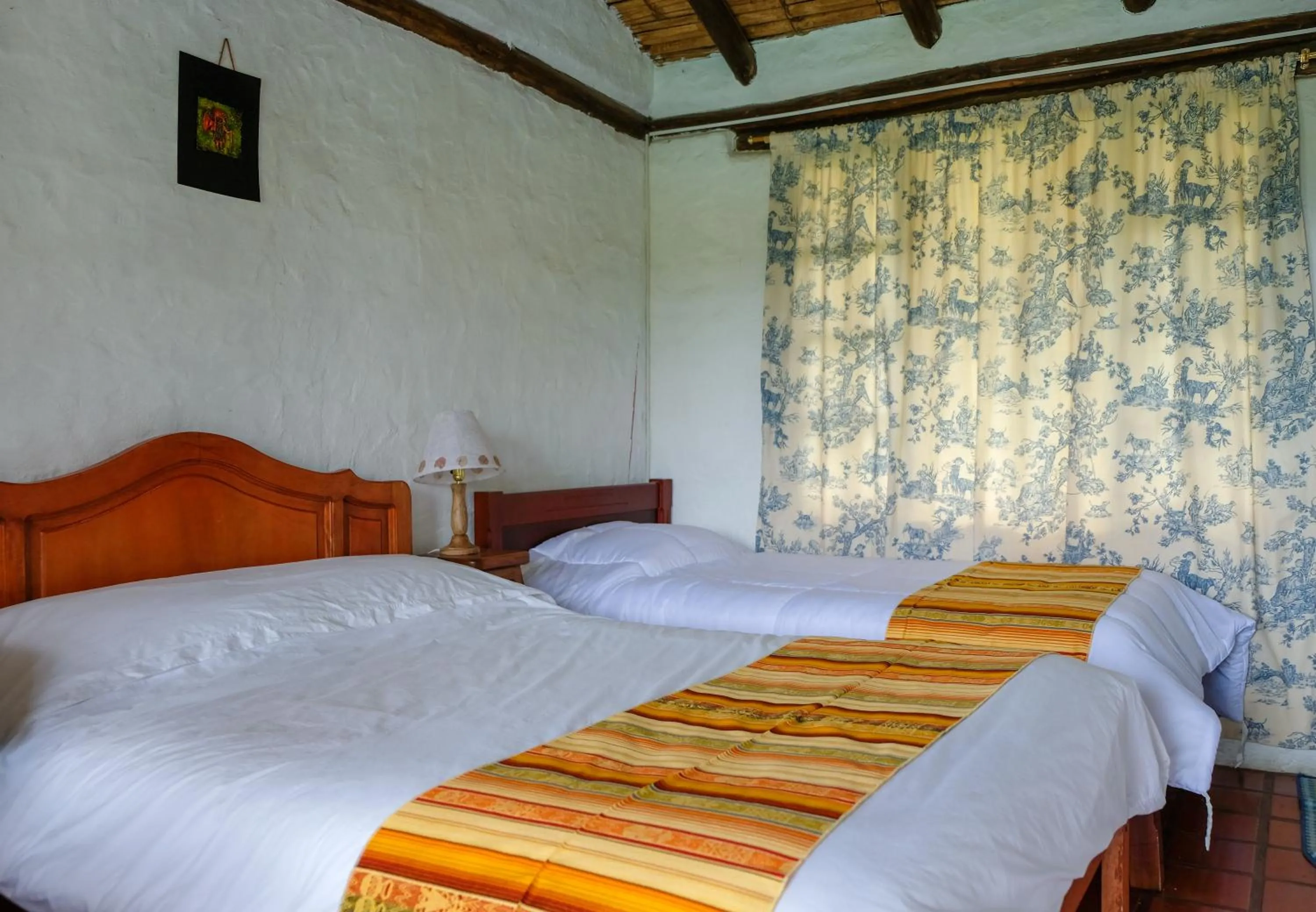 Bed in Hostería Colibri Aeropuerto