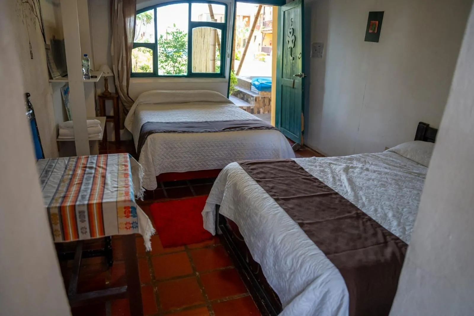 Bed in Hostería Colibri Aeropuerto