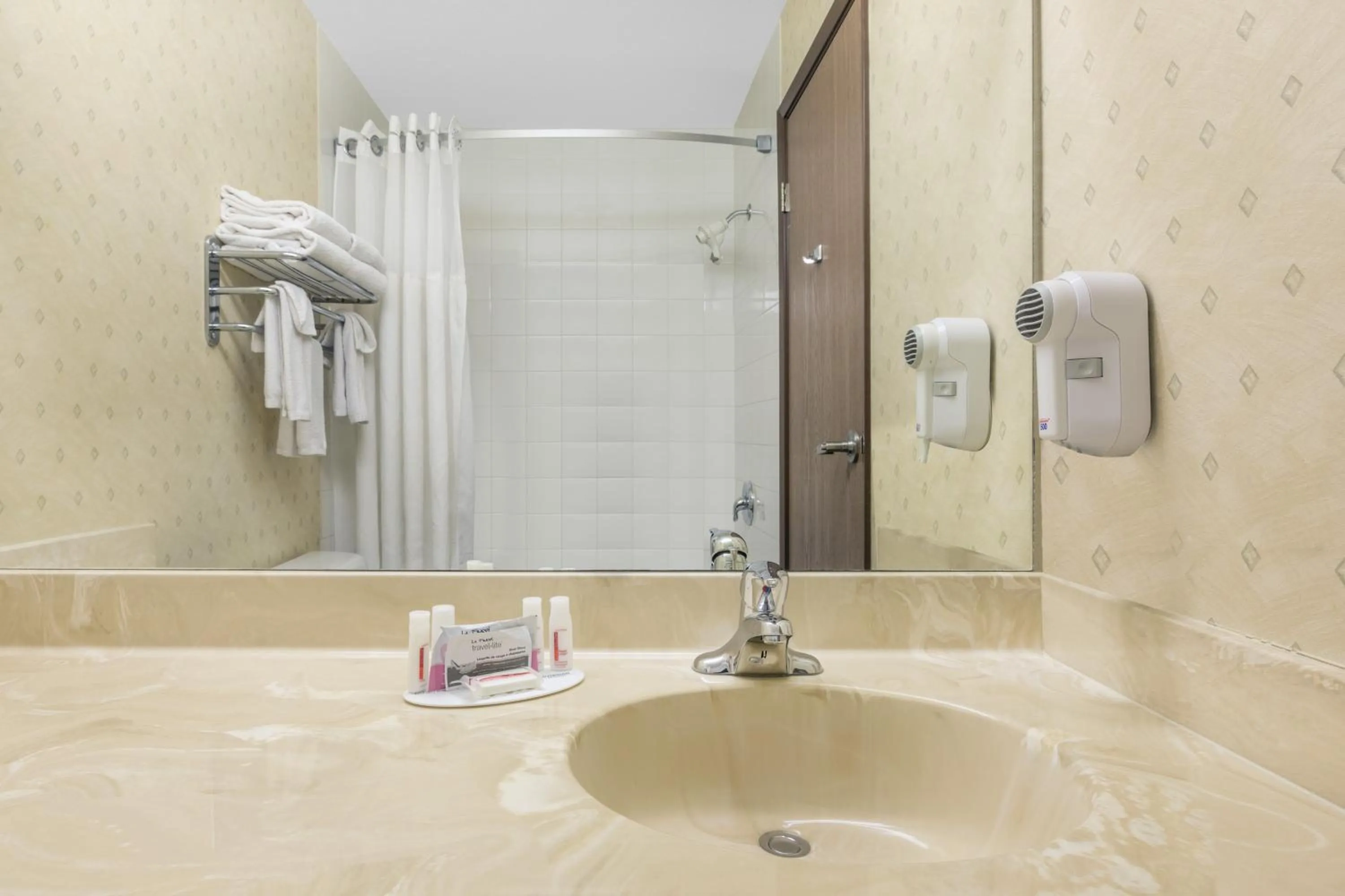 Bathroom in Ramada by Wyndham Clairmont/Grande Prairie