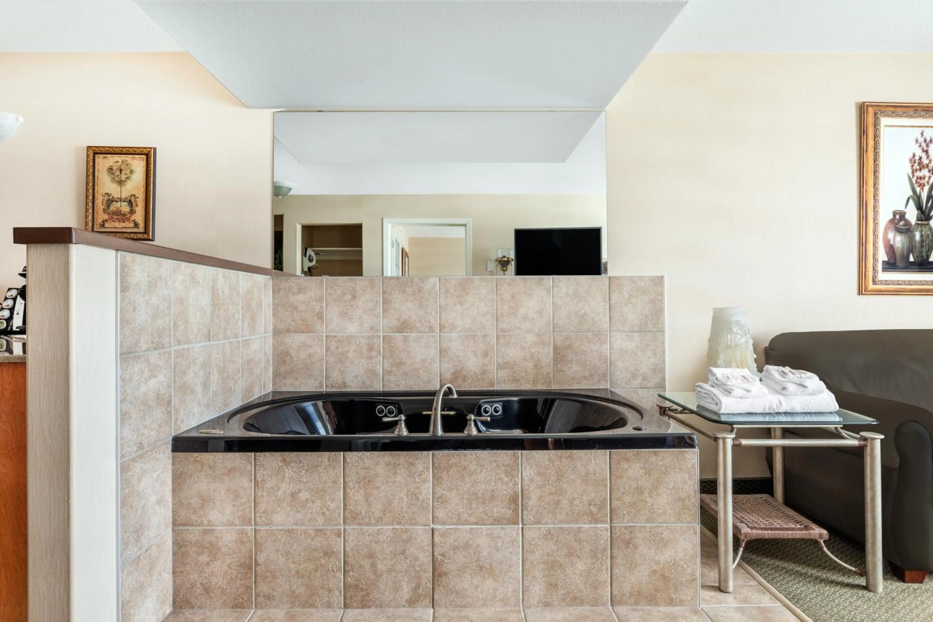 Living room in Ramada by Wyndham Clairmont/Grande Prairie