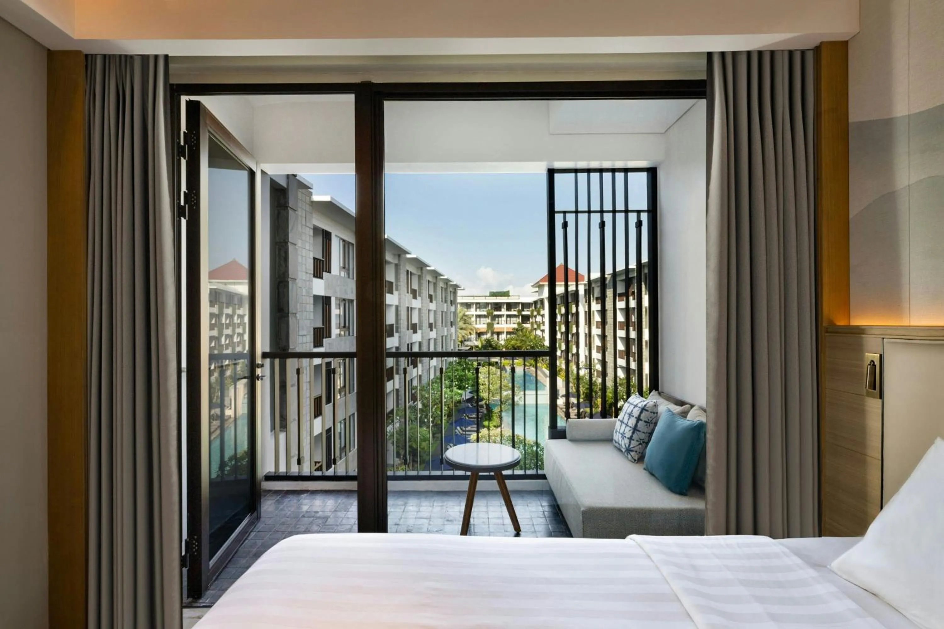 Swimming pool, Bed in Courtyard by Marriott Bali Seminyak Resort