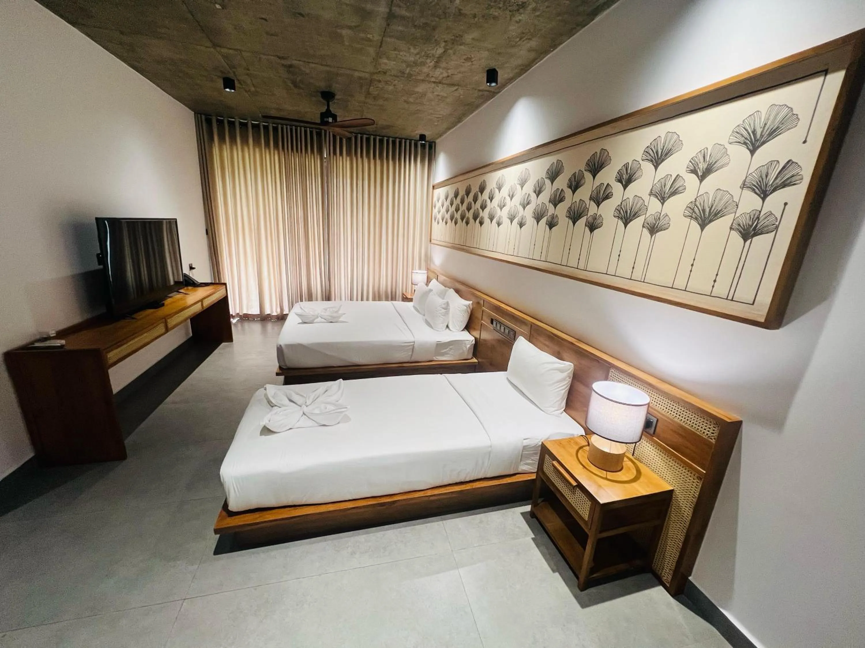 Bed in Ella Flower Garden Resort