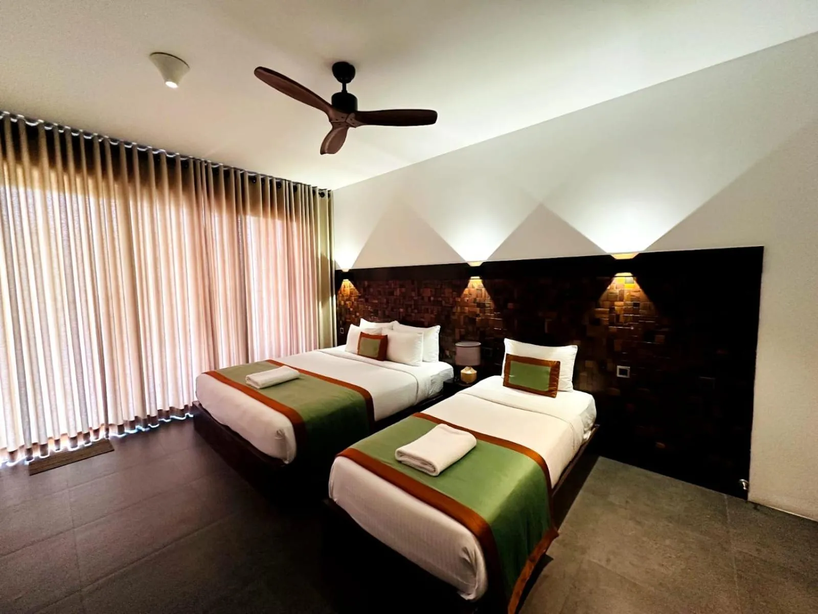 Bed in Ella Flower Garden Resort