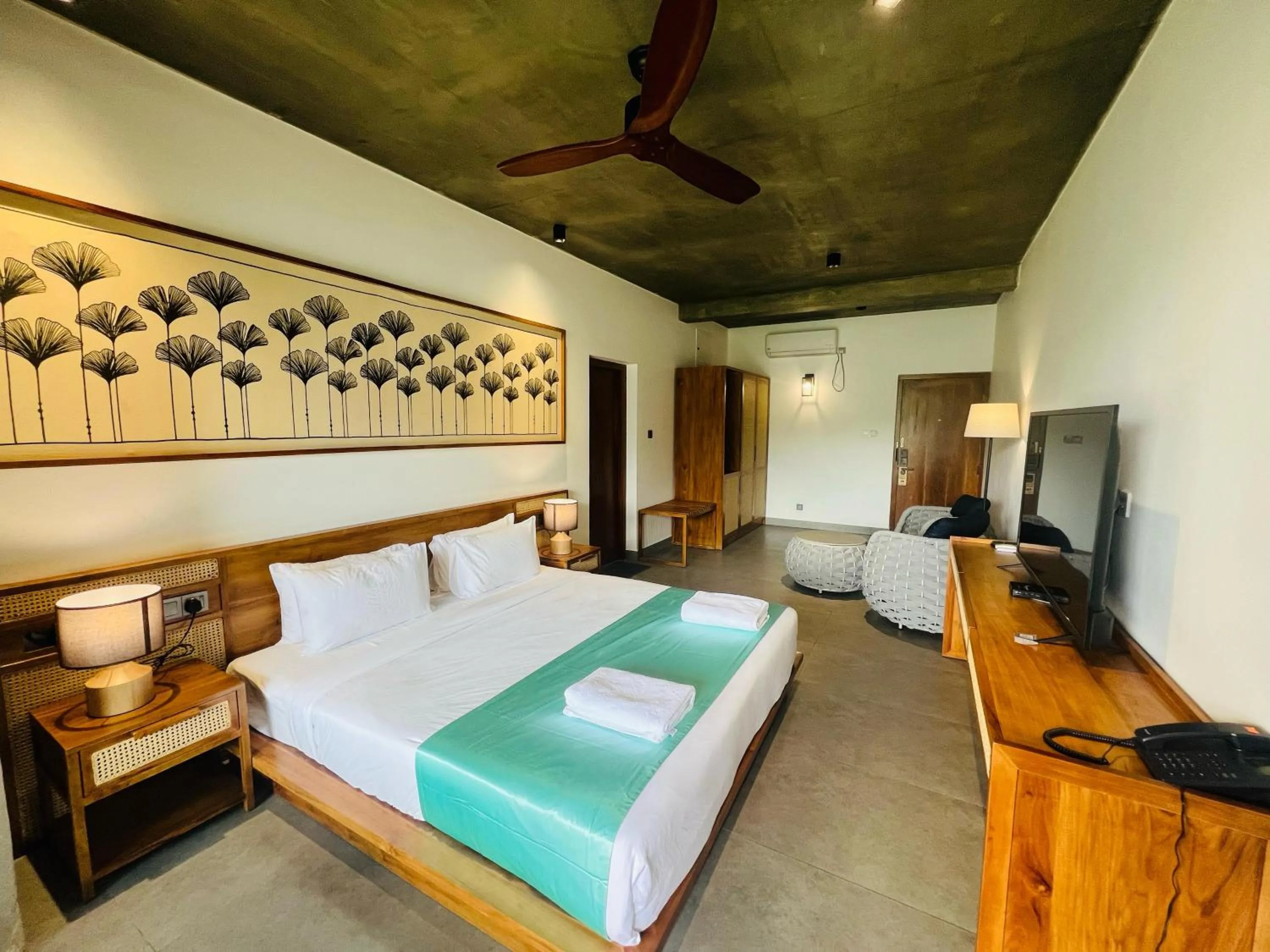 Bed in Ella Flower Garden Resort