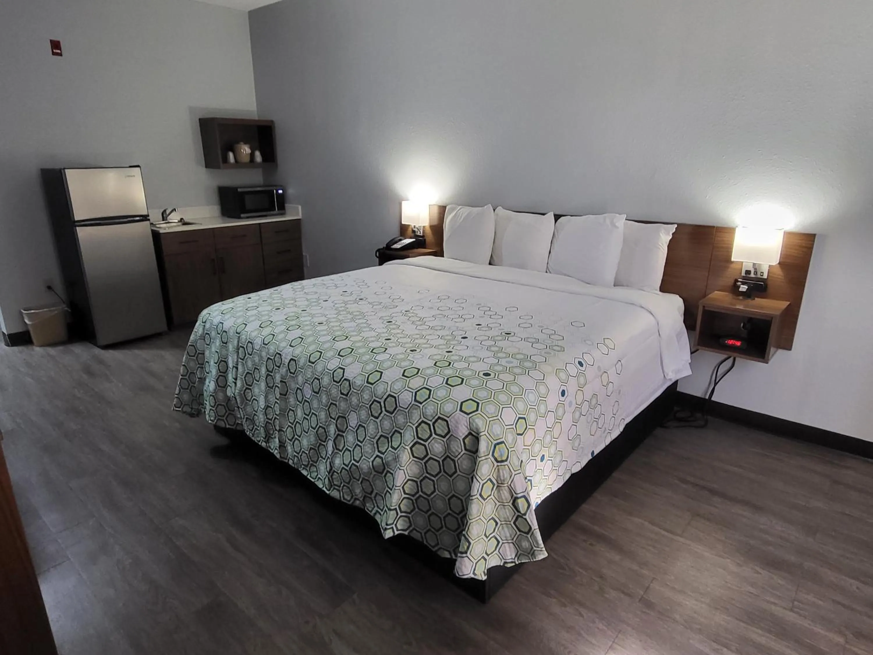 Bedroom, Bed in HomeTowne Studios by Red Roof Prattville