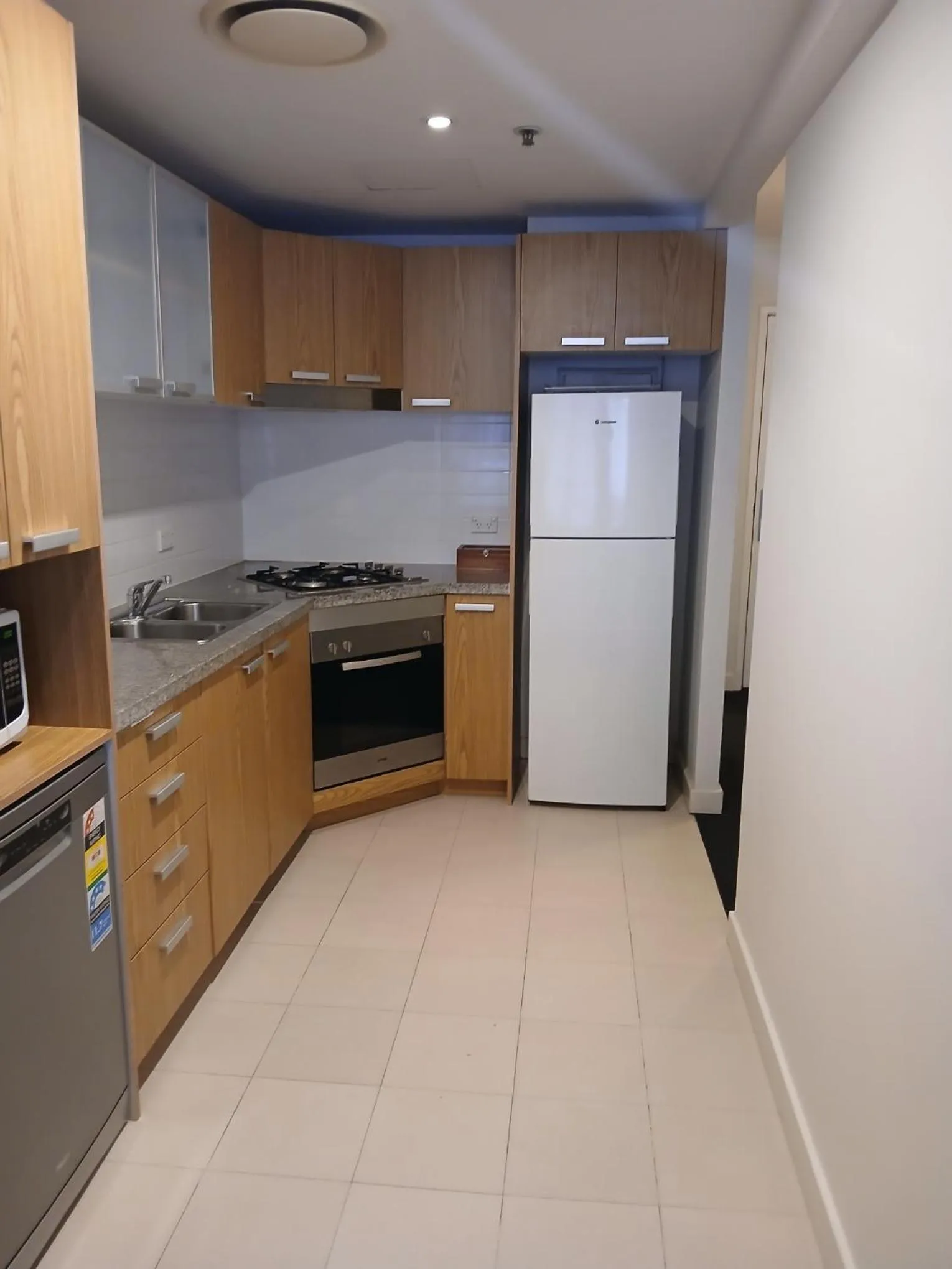 kitchen in Newcastle Central Plaza Apartment Hotel Official