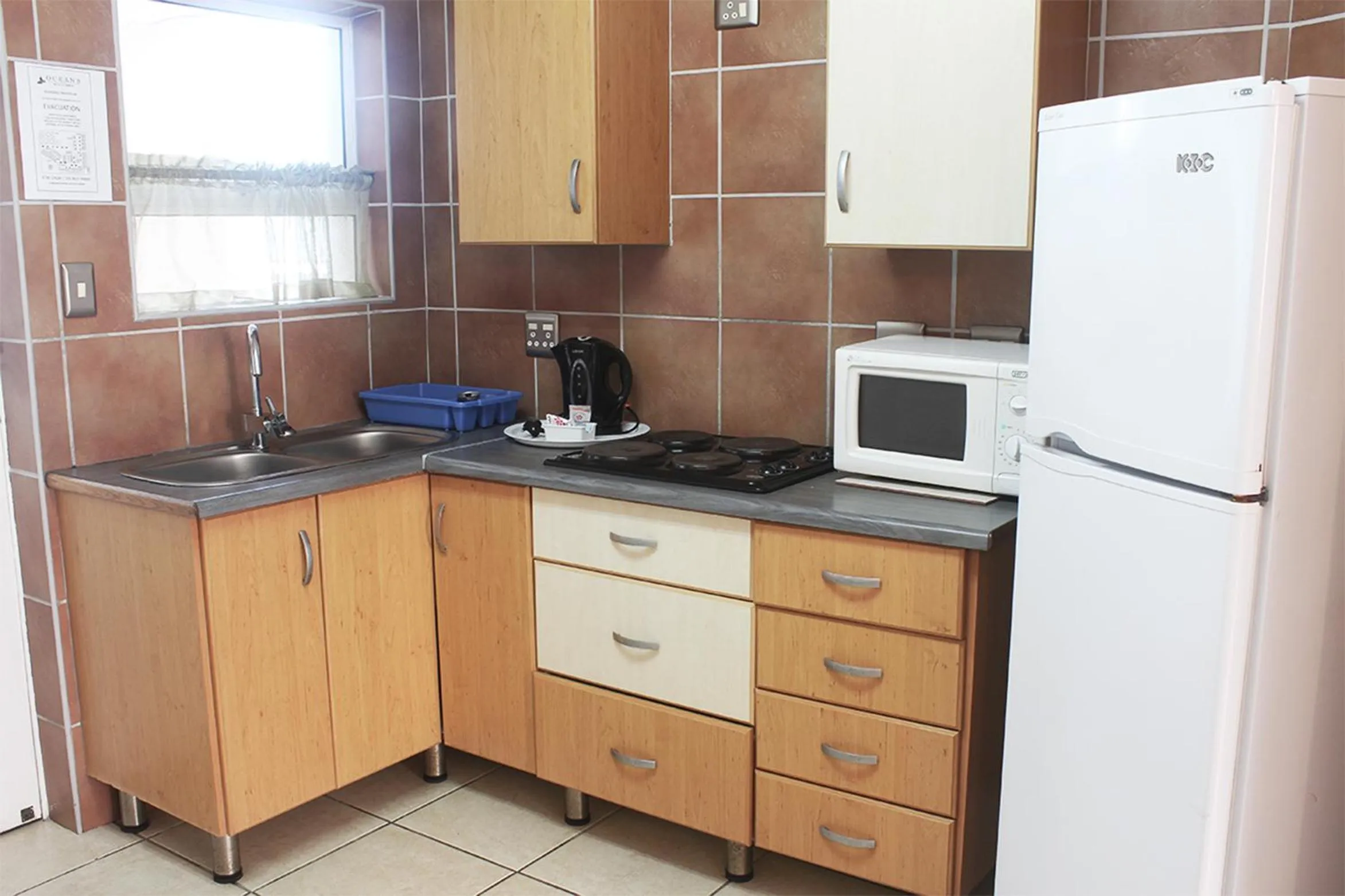 Kitchen or kitchenette in Oceans Hotel & Self Catering