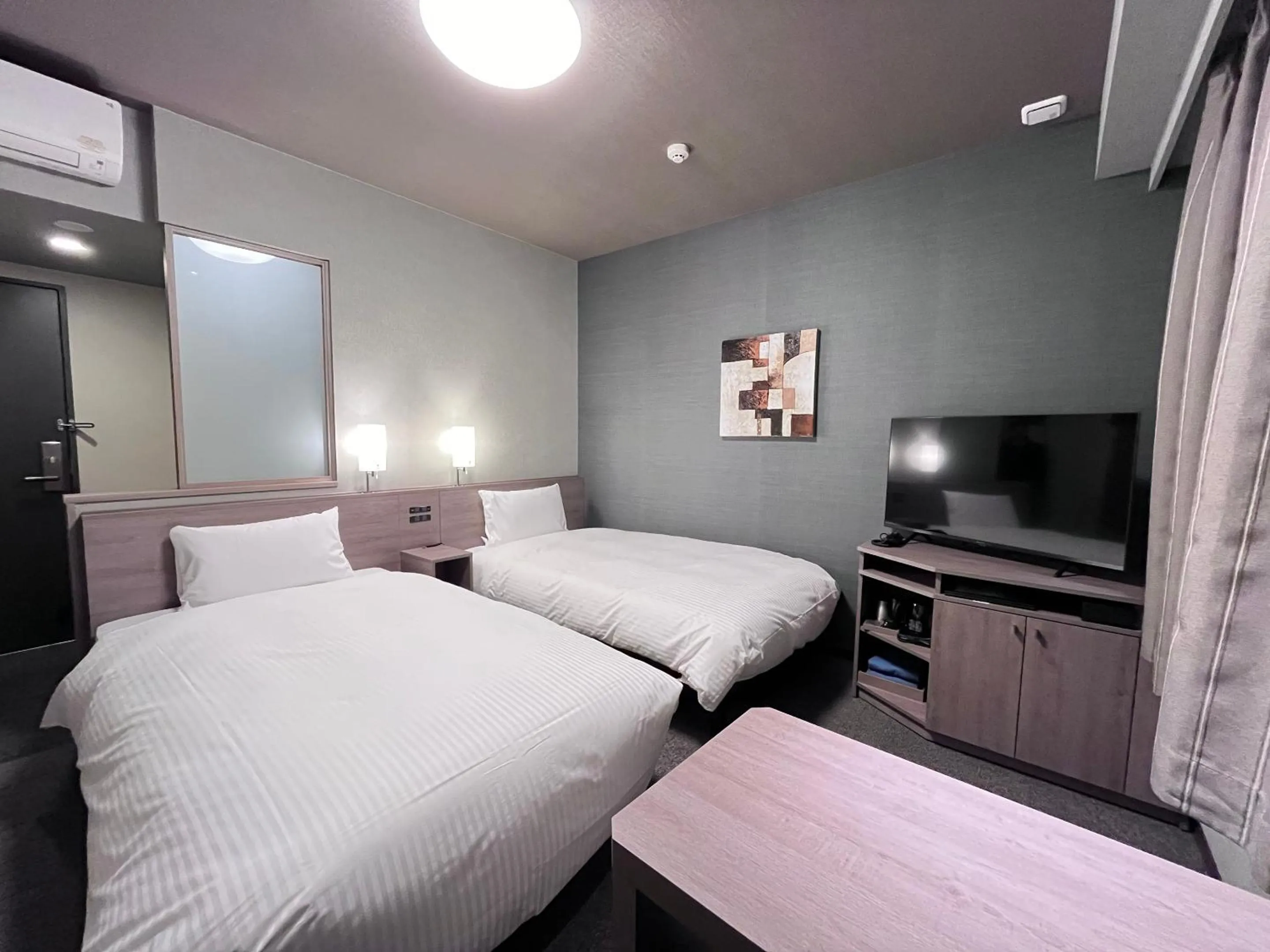 Photo of the whole room, Bed in Hotel Route Inn Kuwana