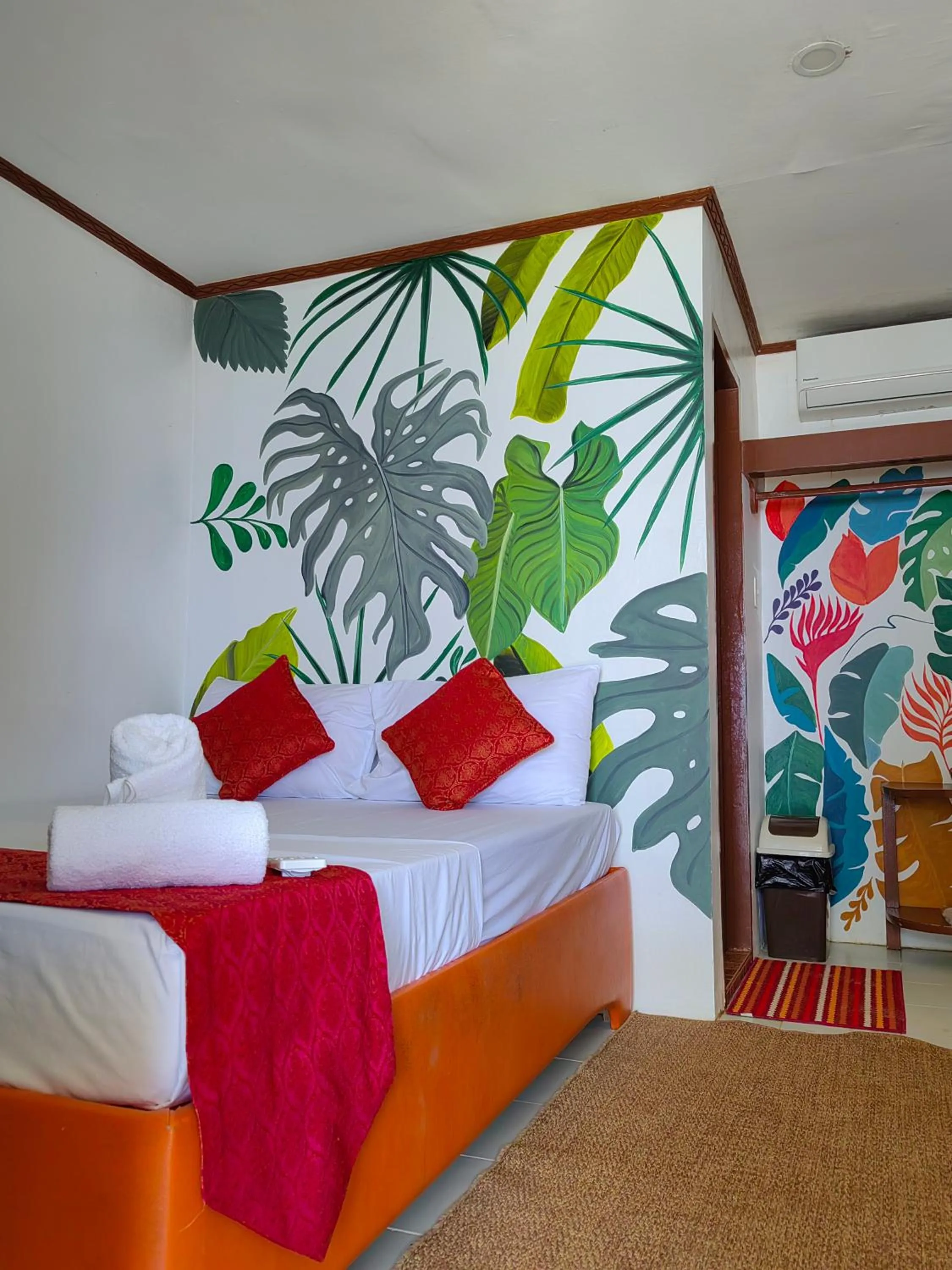 Bed in Orange Pearl Beach Resort