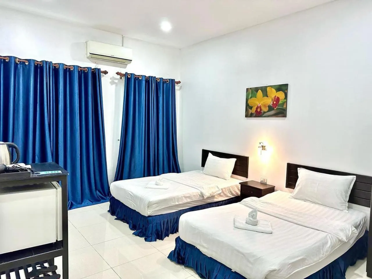 Bed in SUBINH HOTEL AND RESTAURANT