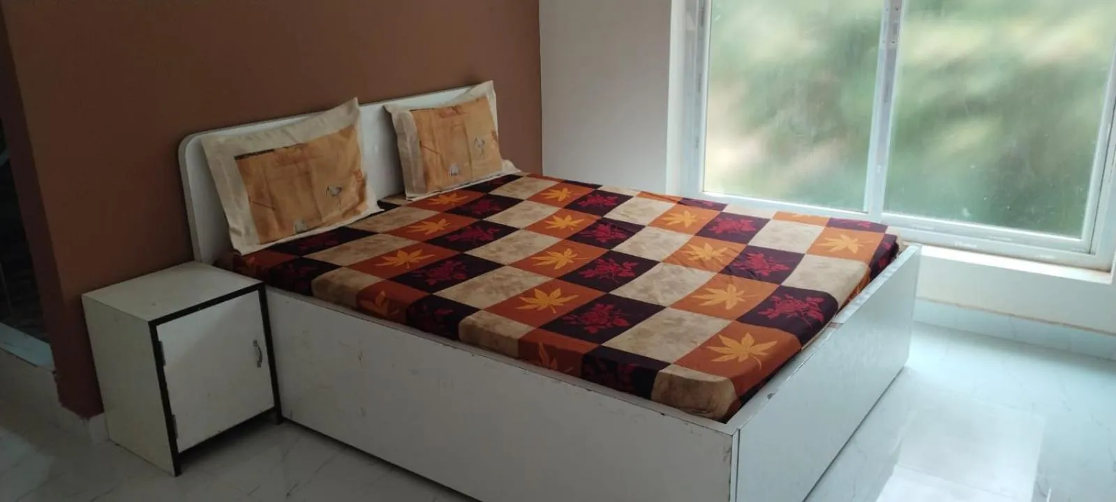 Bed in Le Grace Kovalam