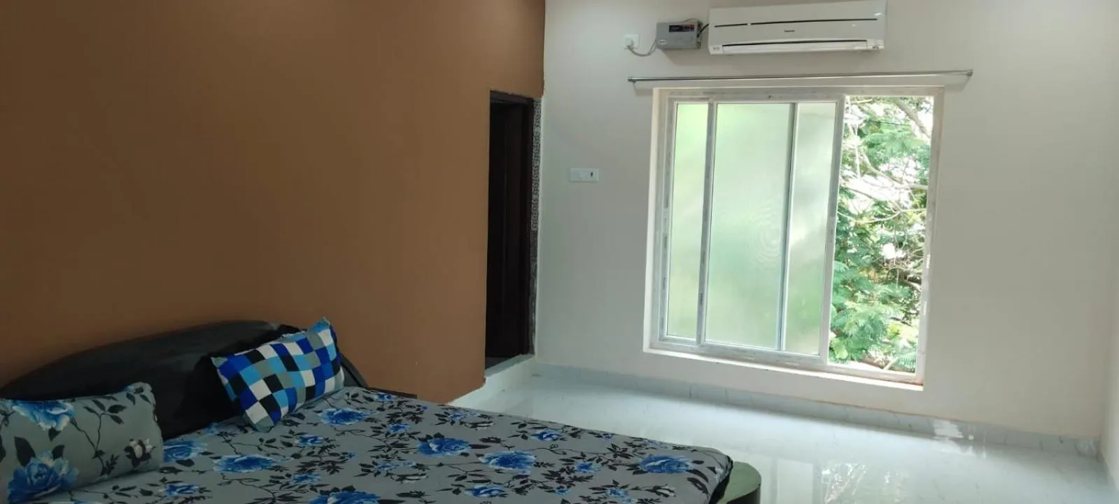 Bed in Le Grace Kovalam