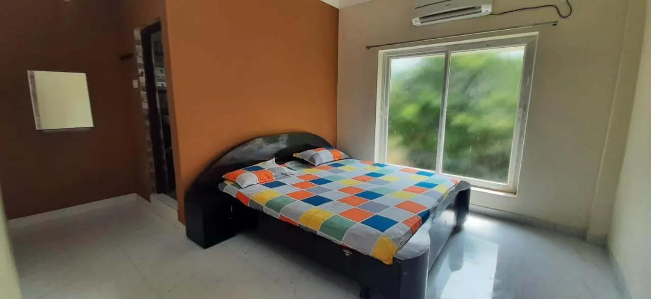 Bed in Le Grace Kovalam