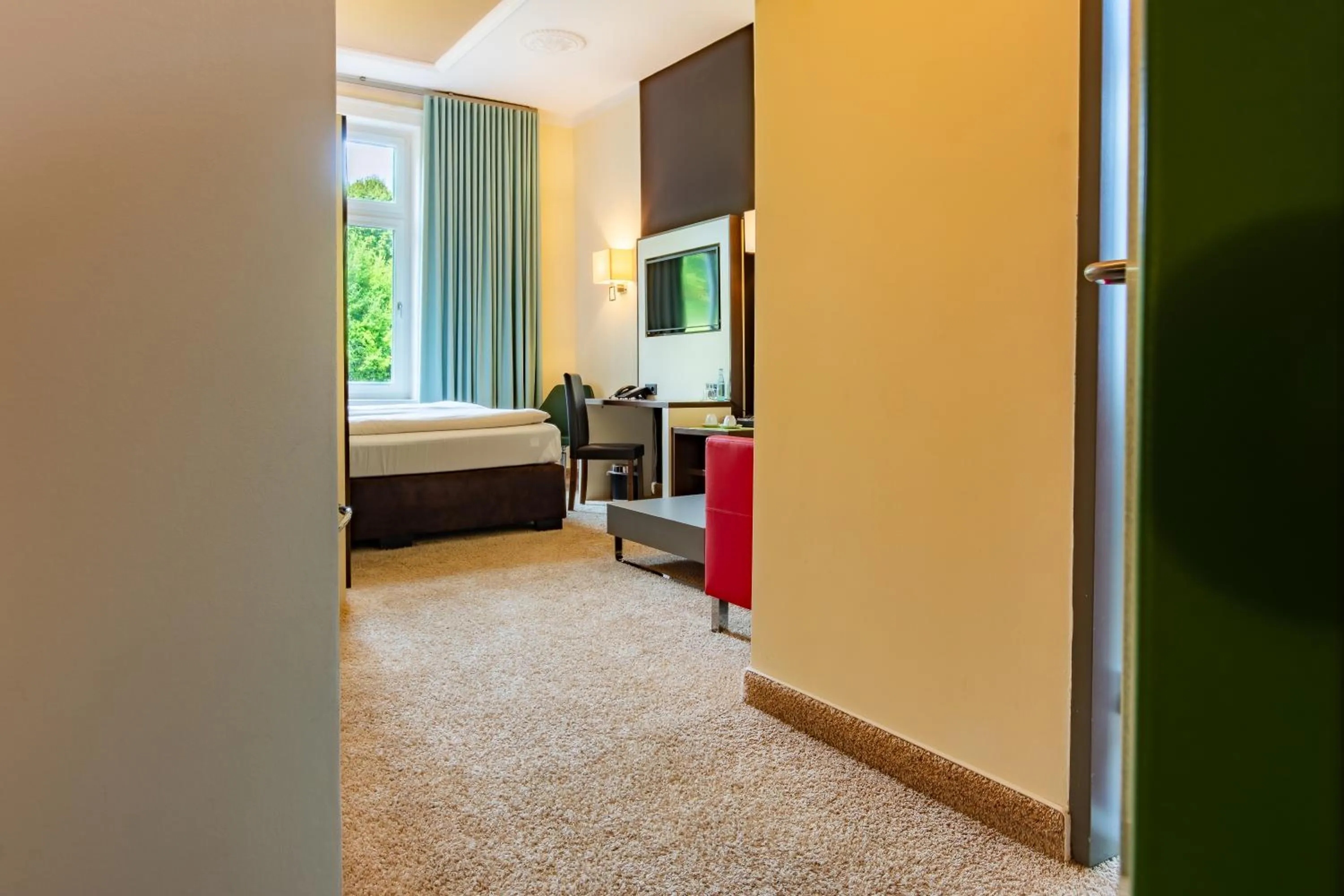 Photo of the whole room, Bed in Parkhotel Bad Rehburg